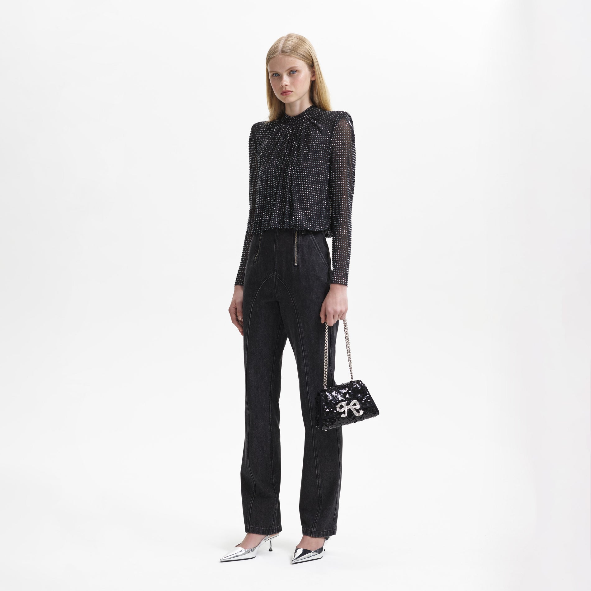 A woman wearing the Black Rhinestone Mesh Top