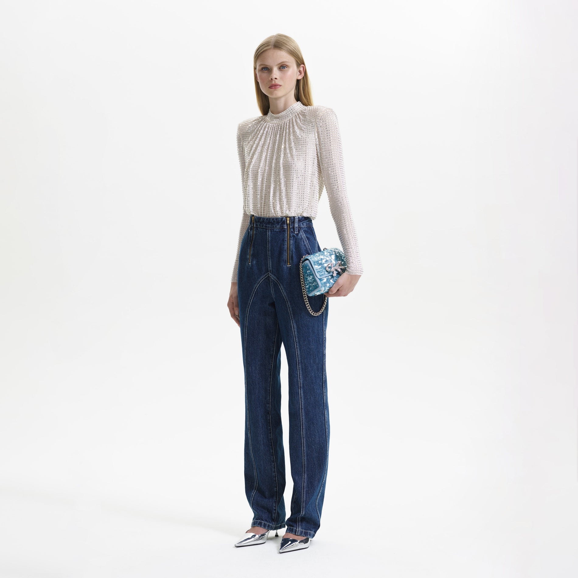 A woman wearing the Cream Rhinestone Mesh Top