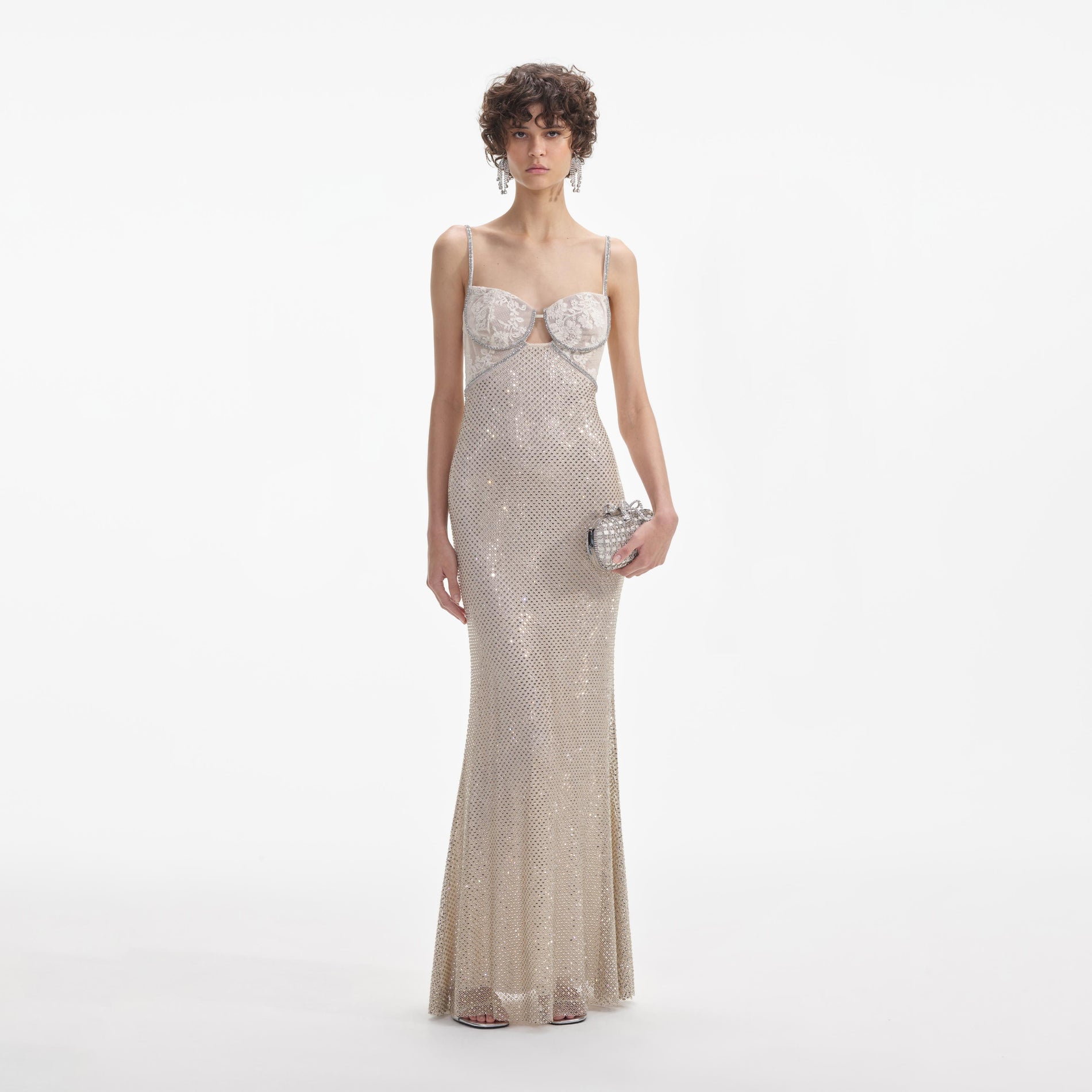 Front view of a woman wearing the Cream Rhinestone Mesh Maxi Dress