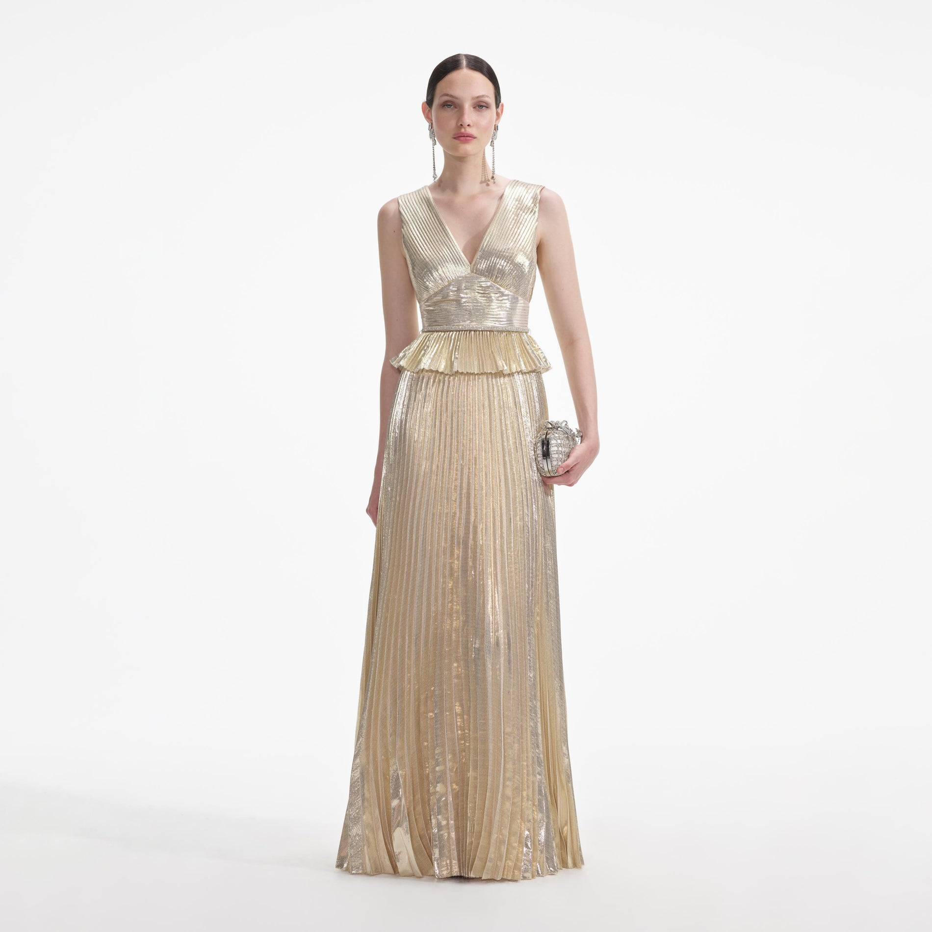 Front view of a woman wearing the Gold Metallic V-Neck Maxi Dress