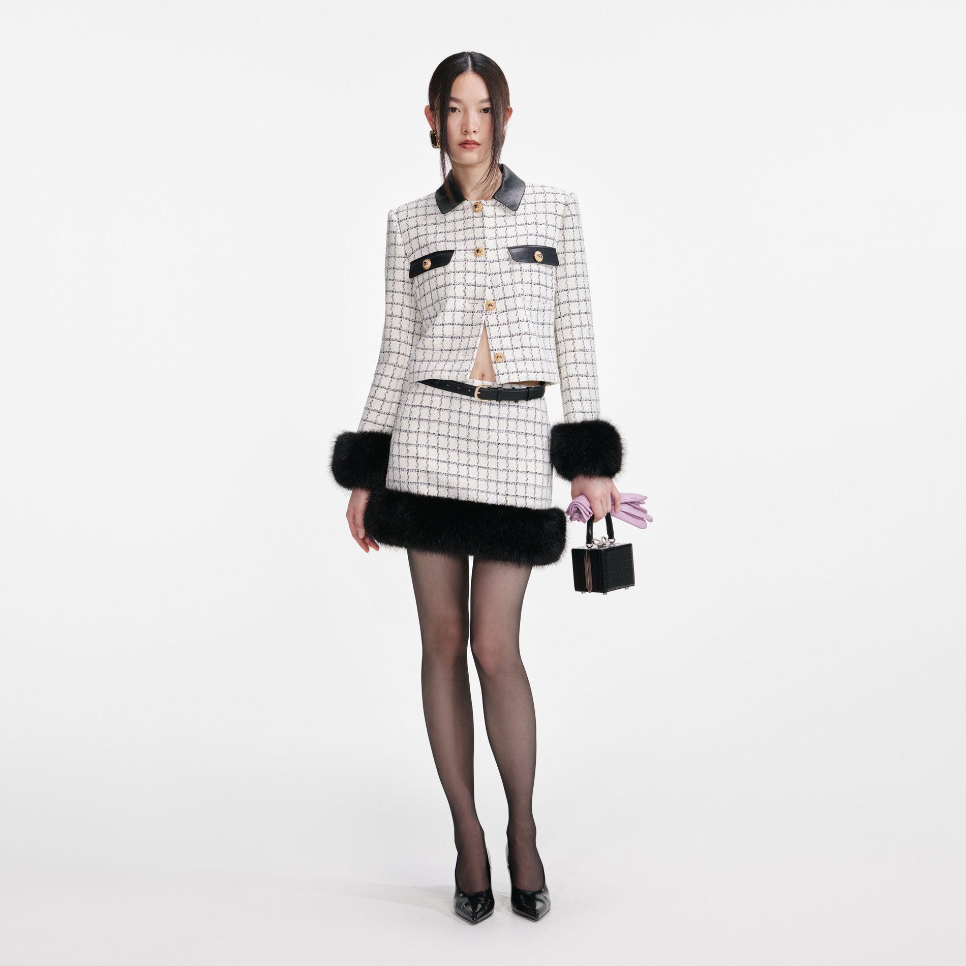 Front view of a woman wearing the Check Boucle Fur Cuff Jacket