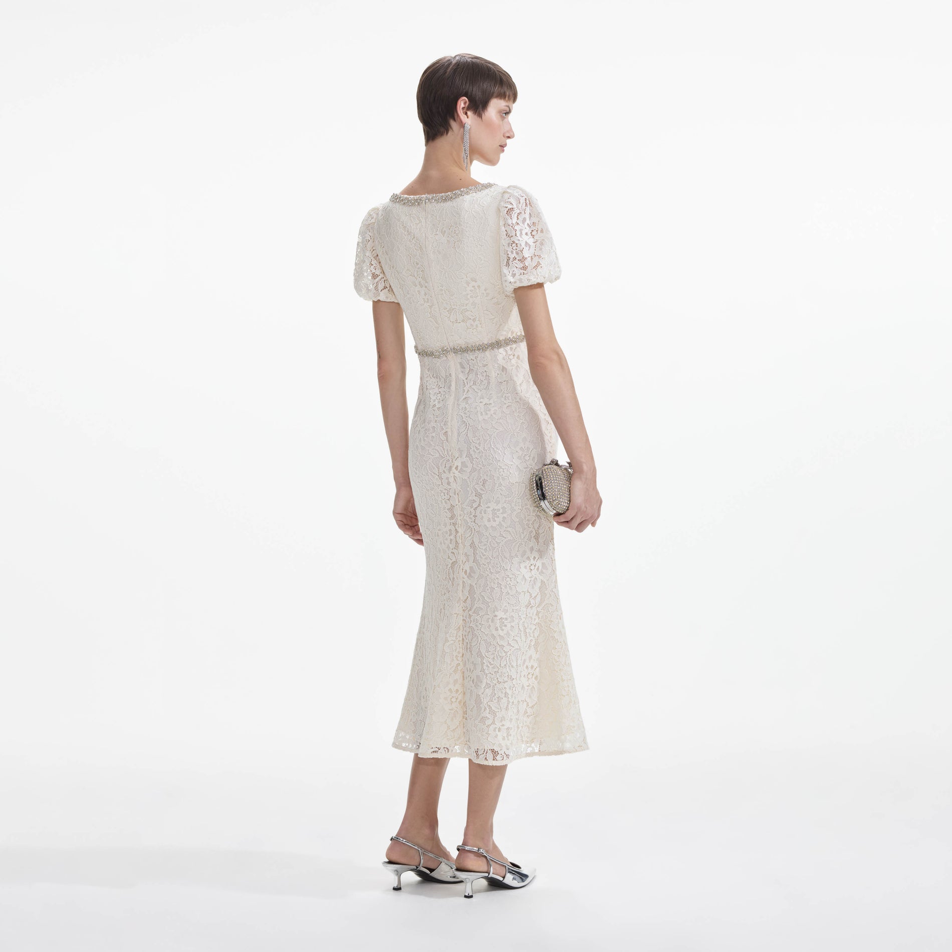 Back view of a woman wearing the Cream Lace Diamante Trim Midi Dress