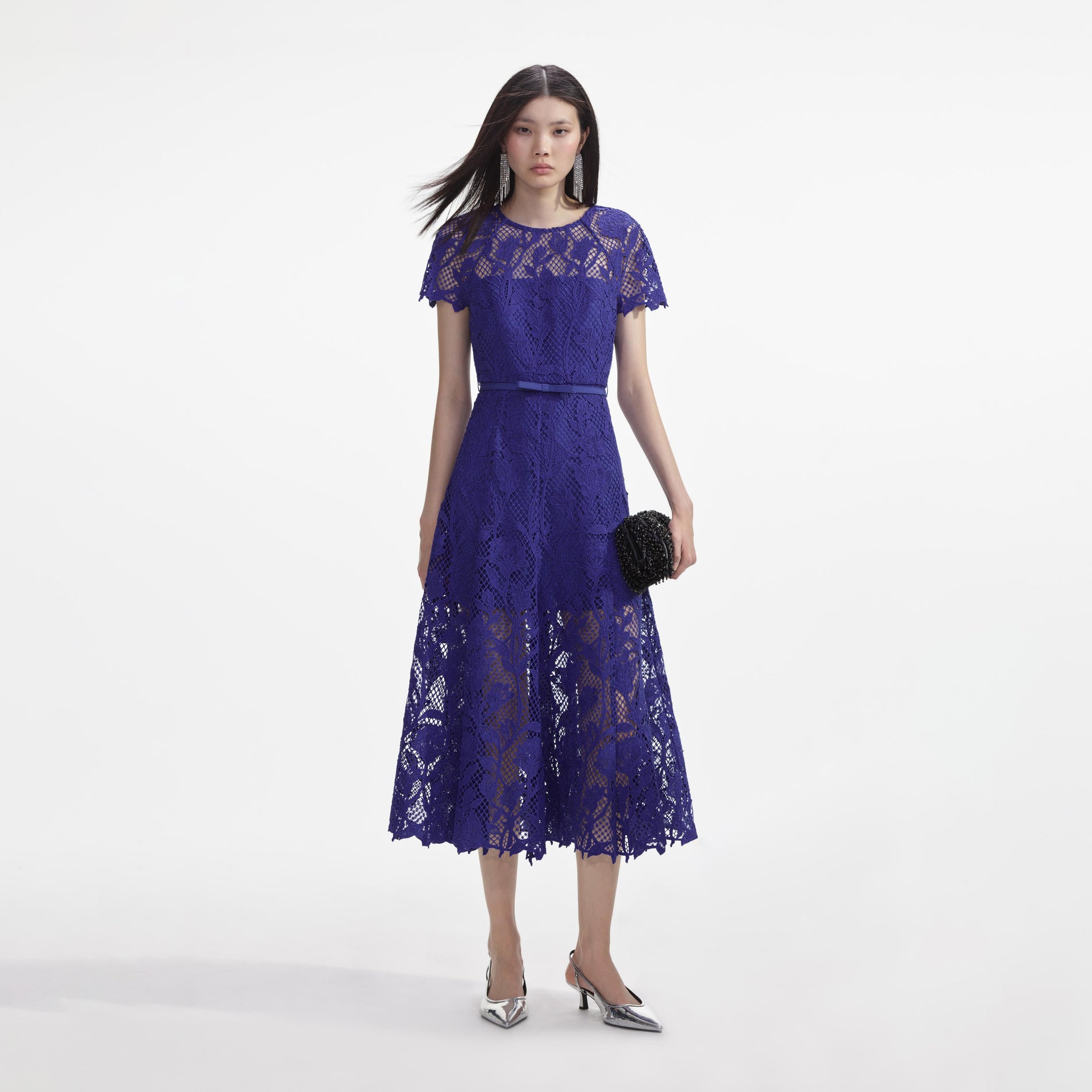 Front view of a woman wearing the Cobalt Lace Midi Dress