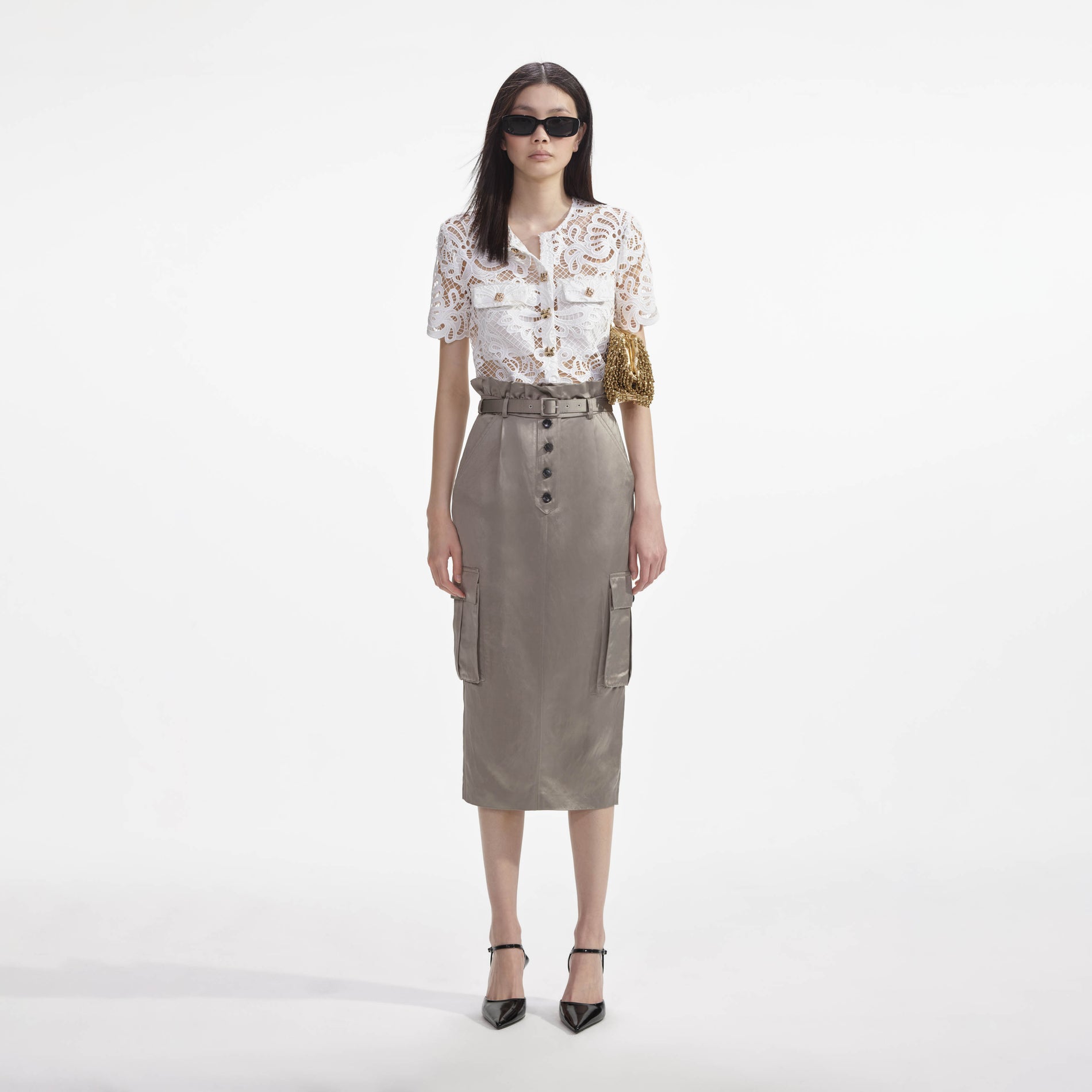 Front view of a woman wearing the White Guipure Lace Top