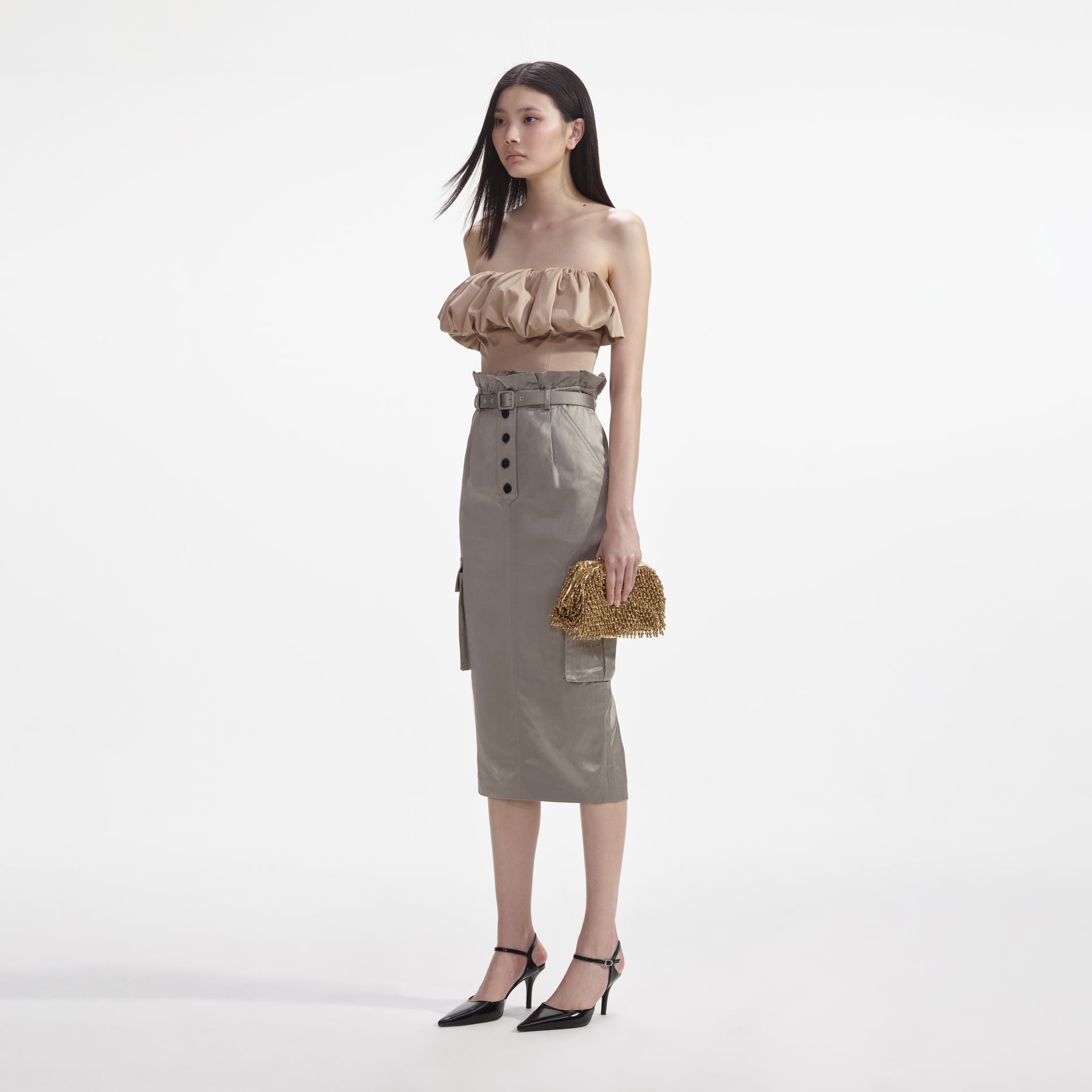 Side view of a woman wearing the Beige Taffeta Bandeau Top