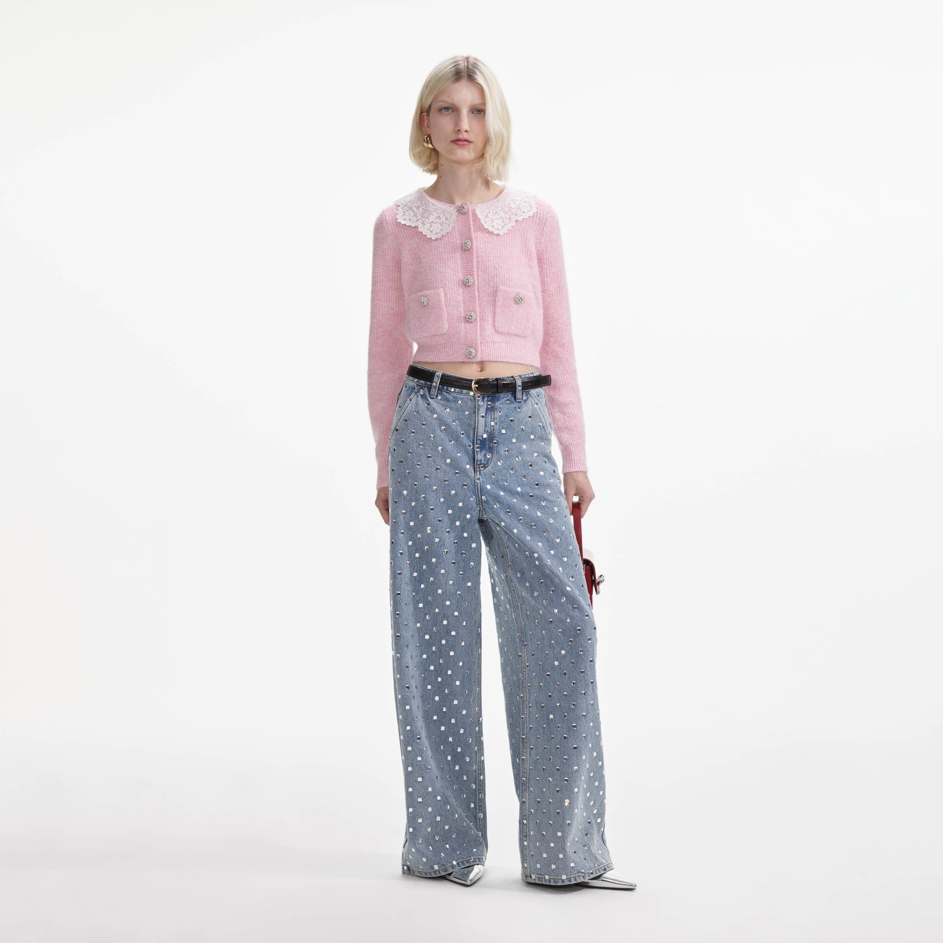 Front view of a woman wearing the Pink Fluffy Rib Knit Cardigan