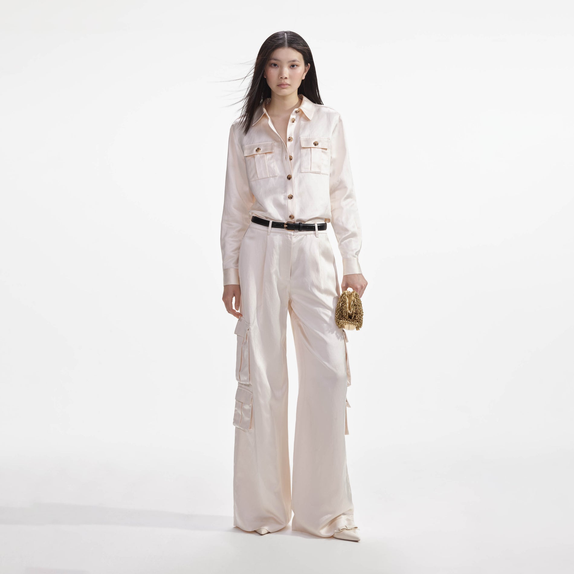 Front view of a woman wearing the Cream Satin Shirt