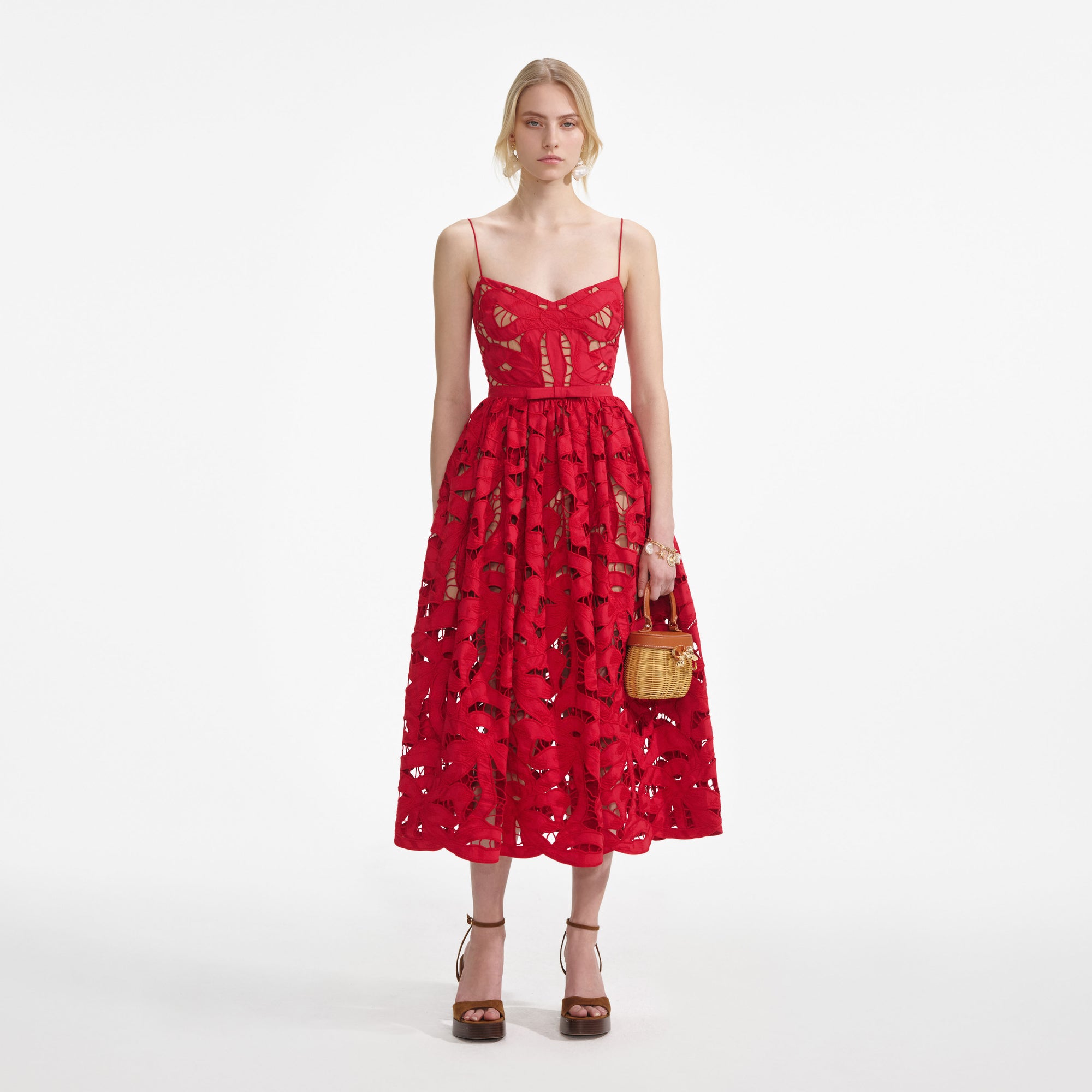 Front view of a woman wearing the Red Bow Embroidered Midi Dress