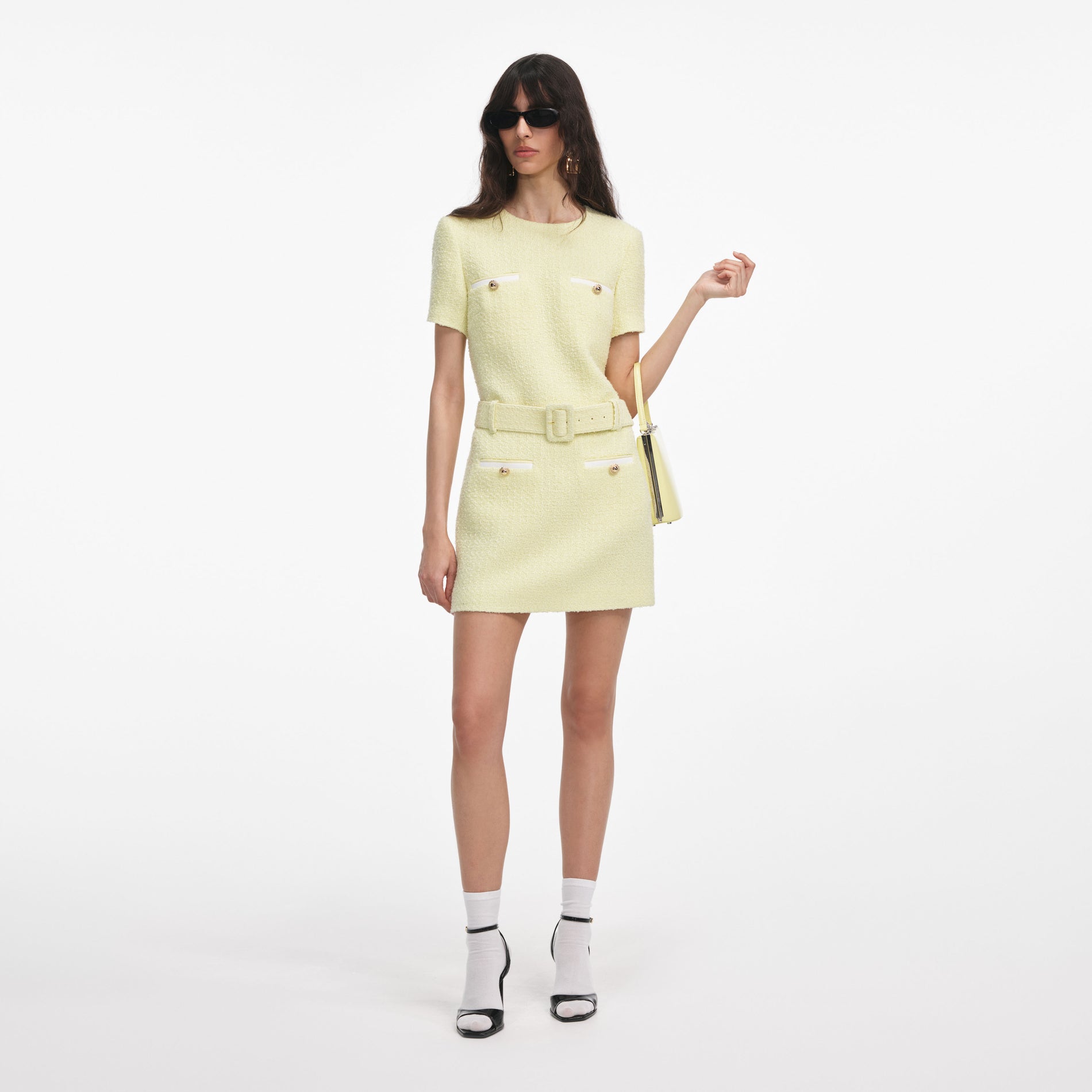 Front view of a woman wearing the Yellow Boucle Mini Dress