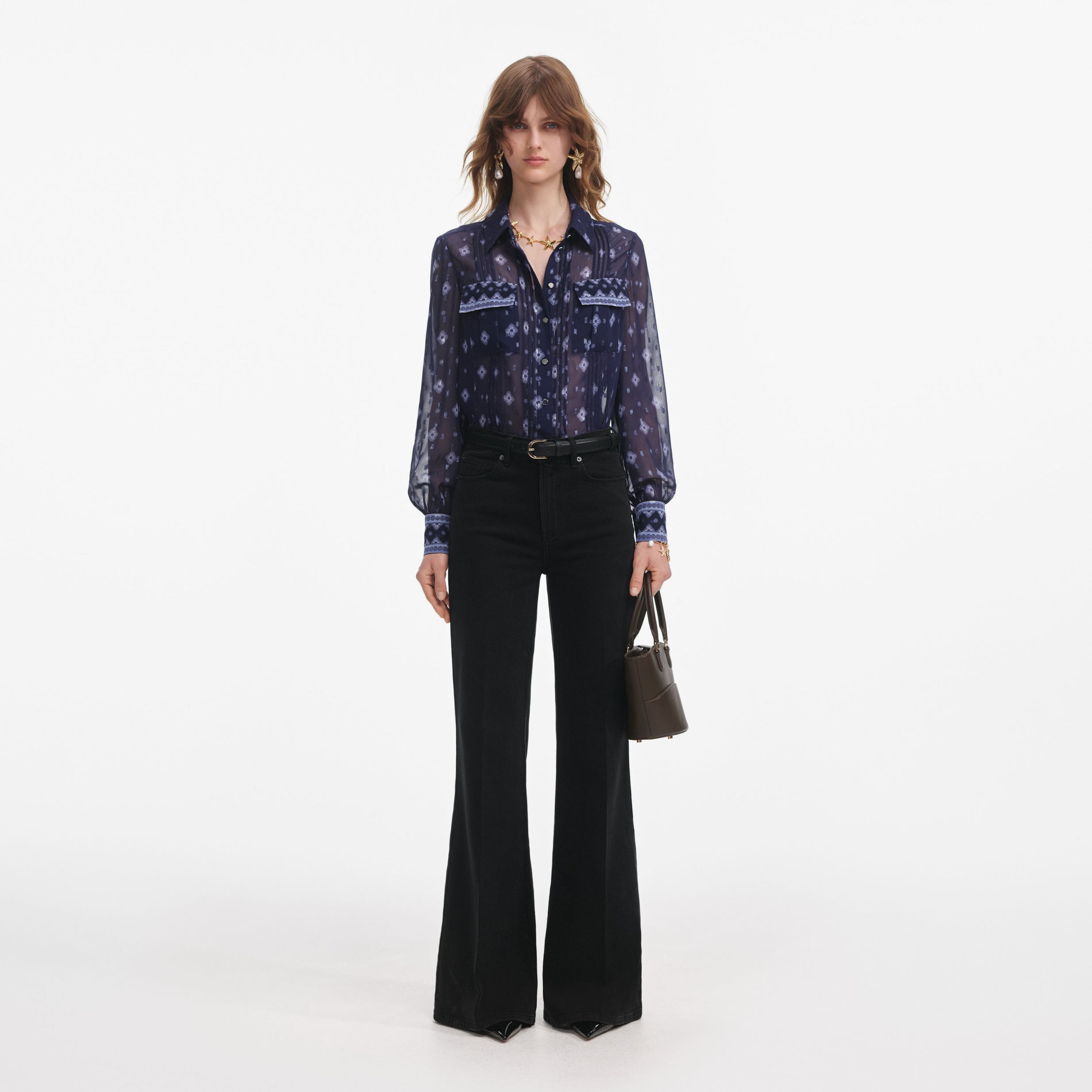 Front view of a woman wearing the Navy Printed Chiffon Blouse