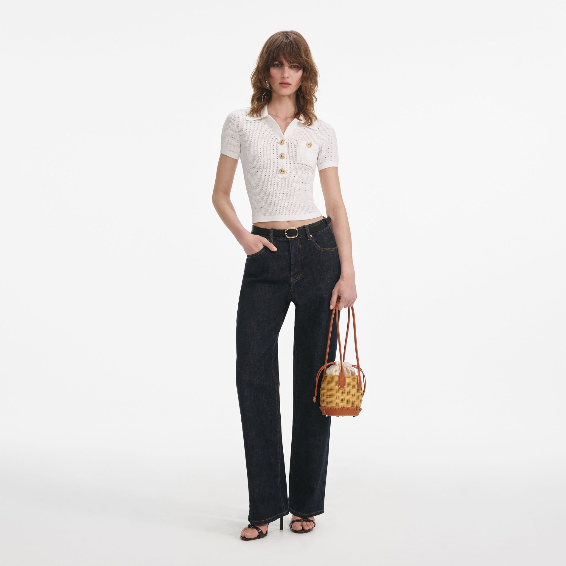 Front view of a woman wearing the White Pointelle Knit Top