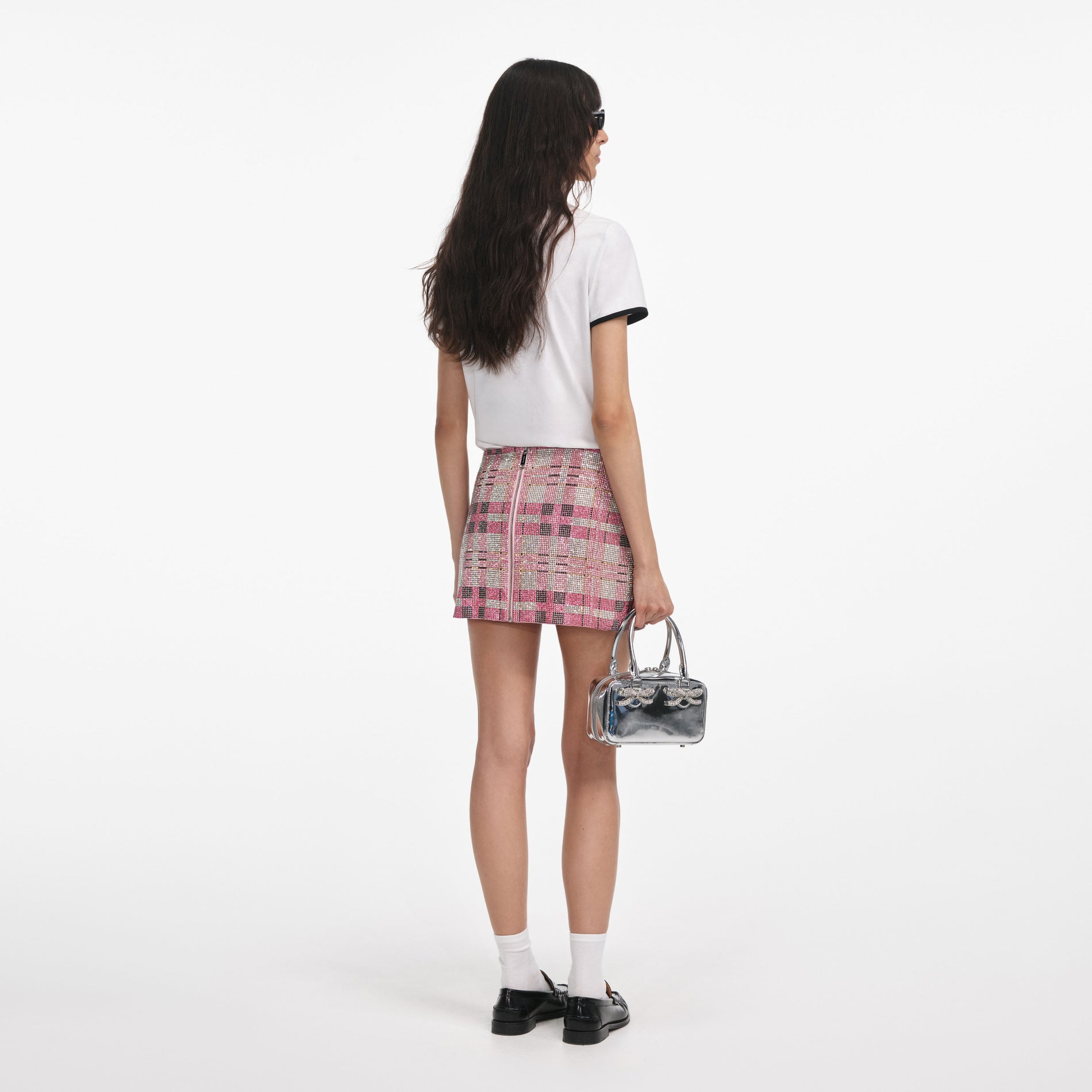 Back view of a woman wearing the White T-Shirt With Embroidered Logo
