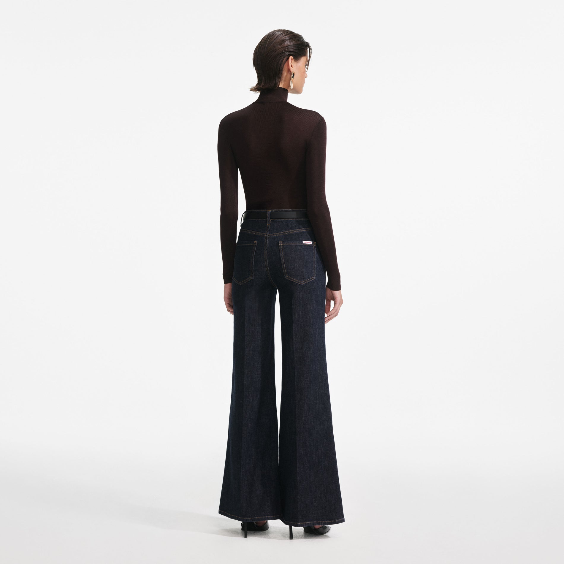 Back view of a woman wearing the Brown Viscose Knit Top