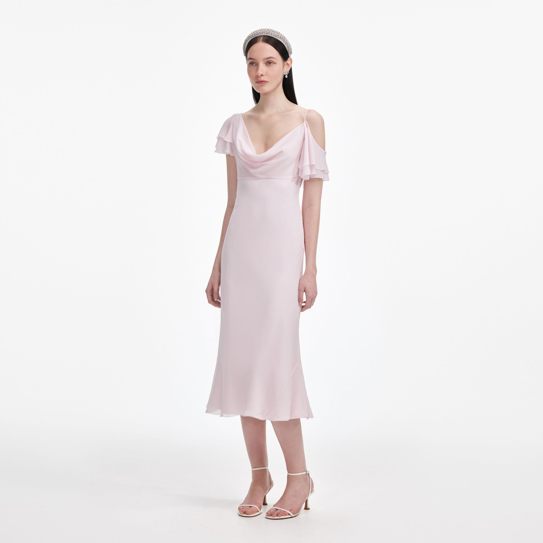 Side view of a woman wearing the Pink Georgette Frill Midi Dress