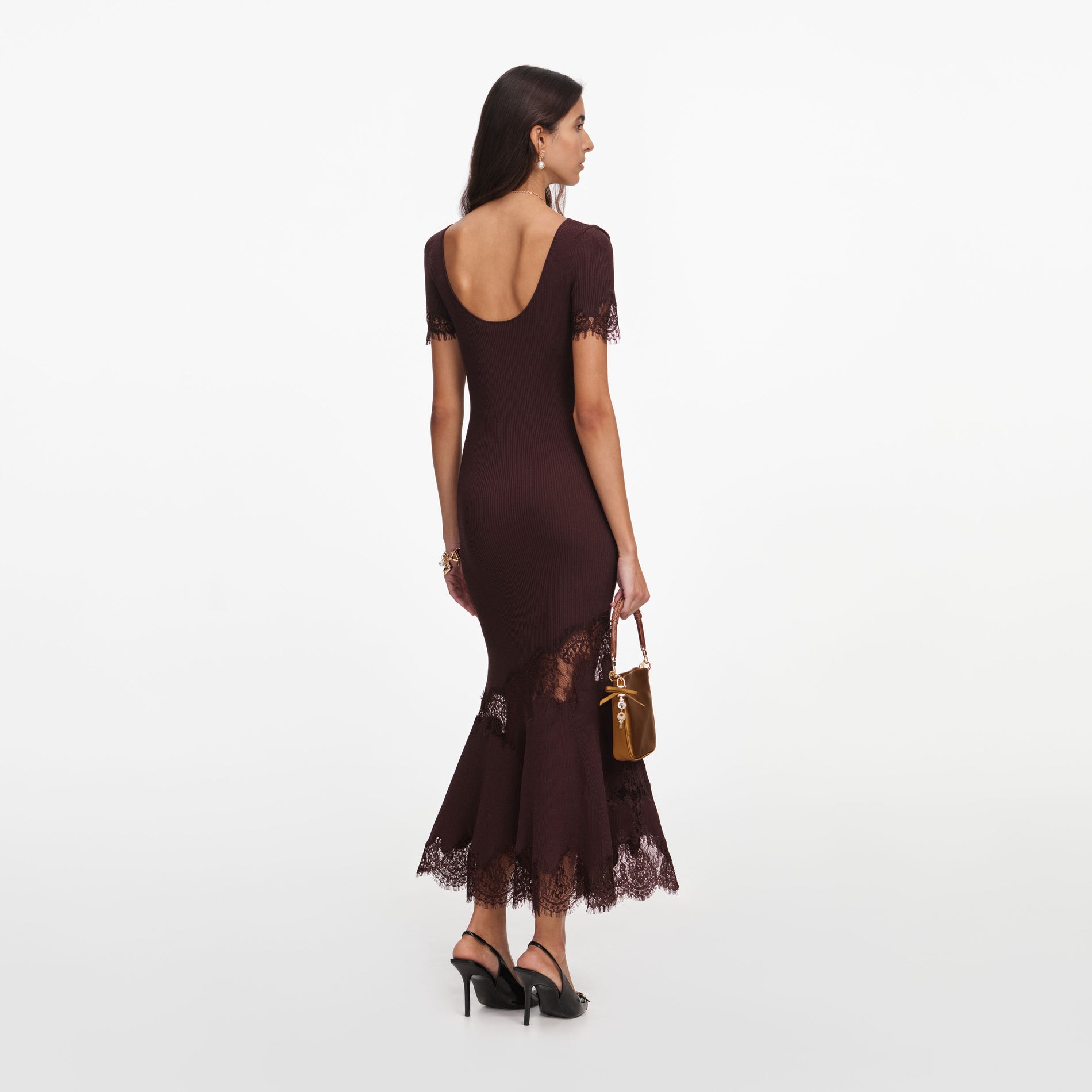 Back view of a woman wearing the Brown Ribbed Knit Midi Dress