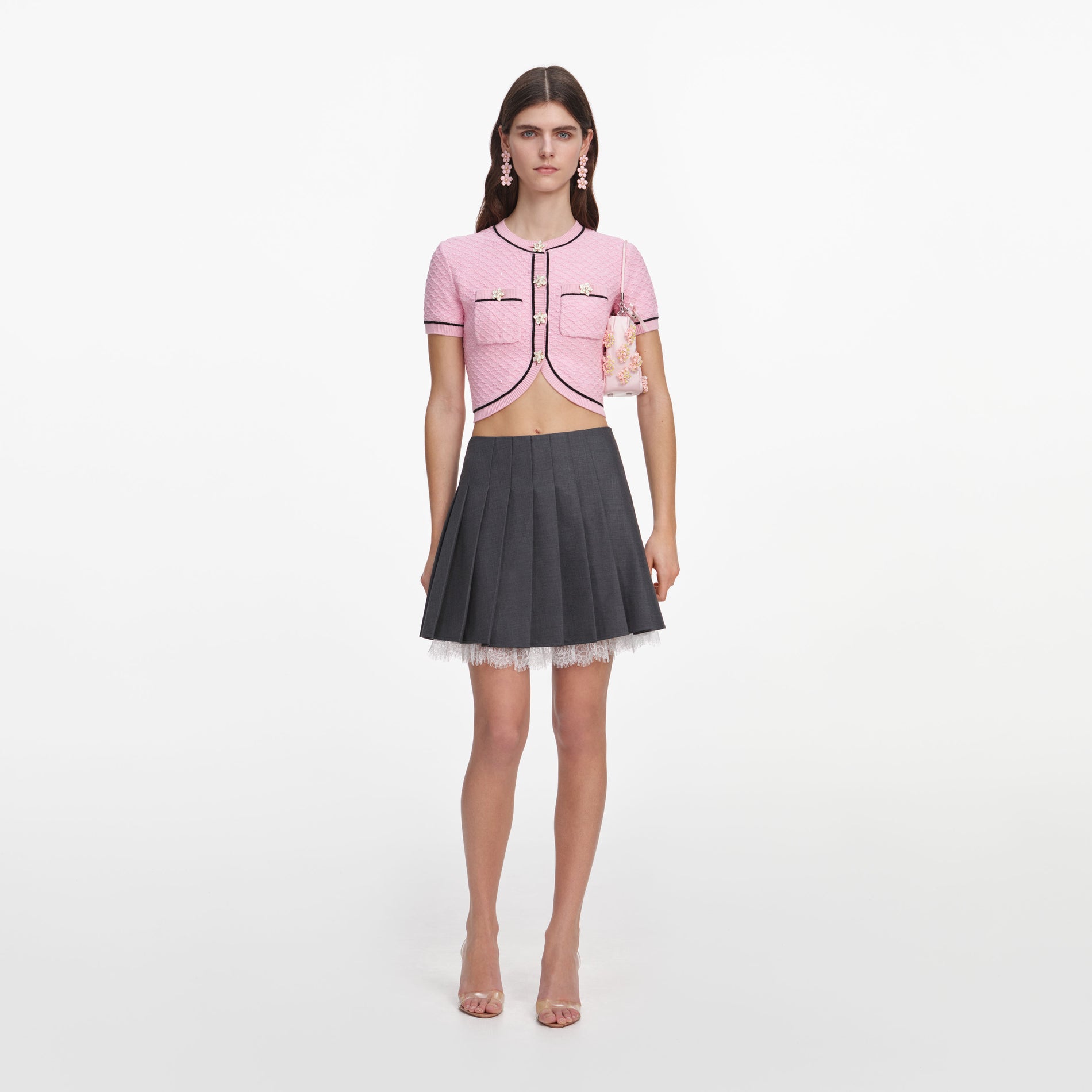 Front view of a woman wearing the Pink Flower Knit Top