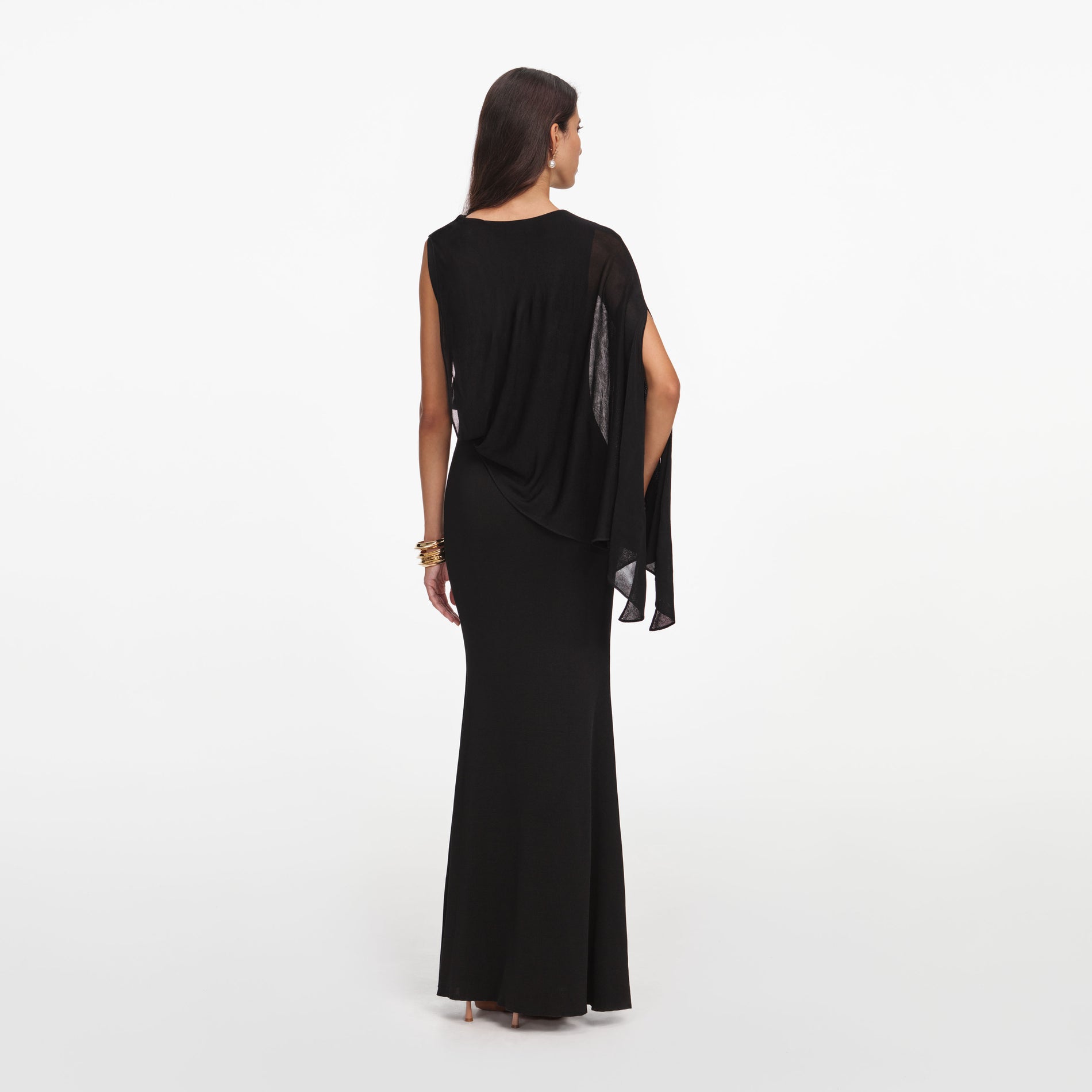 Back view of a woman wearing the Black Viscose Knit One Shoulder Maxi Dress