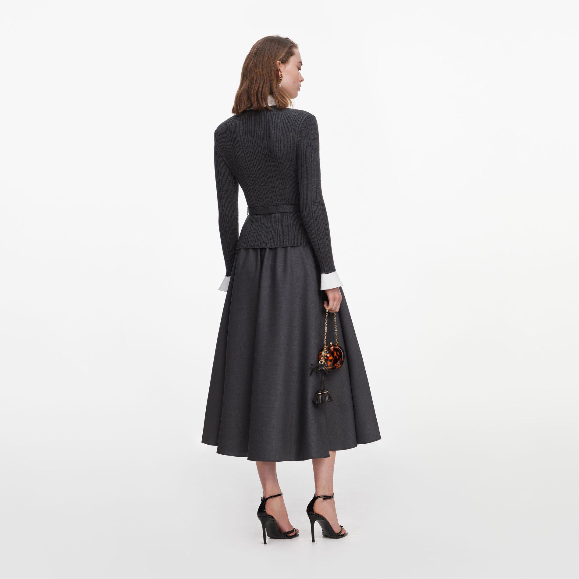Back view of a woman wearing the Grey Knit Twill Midi Dress