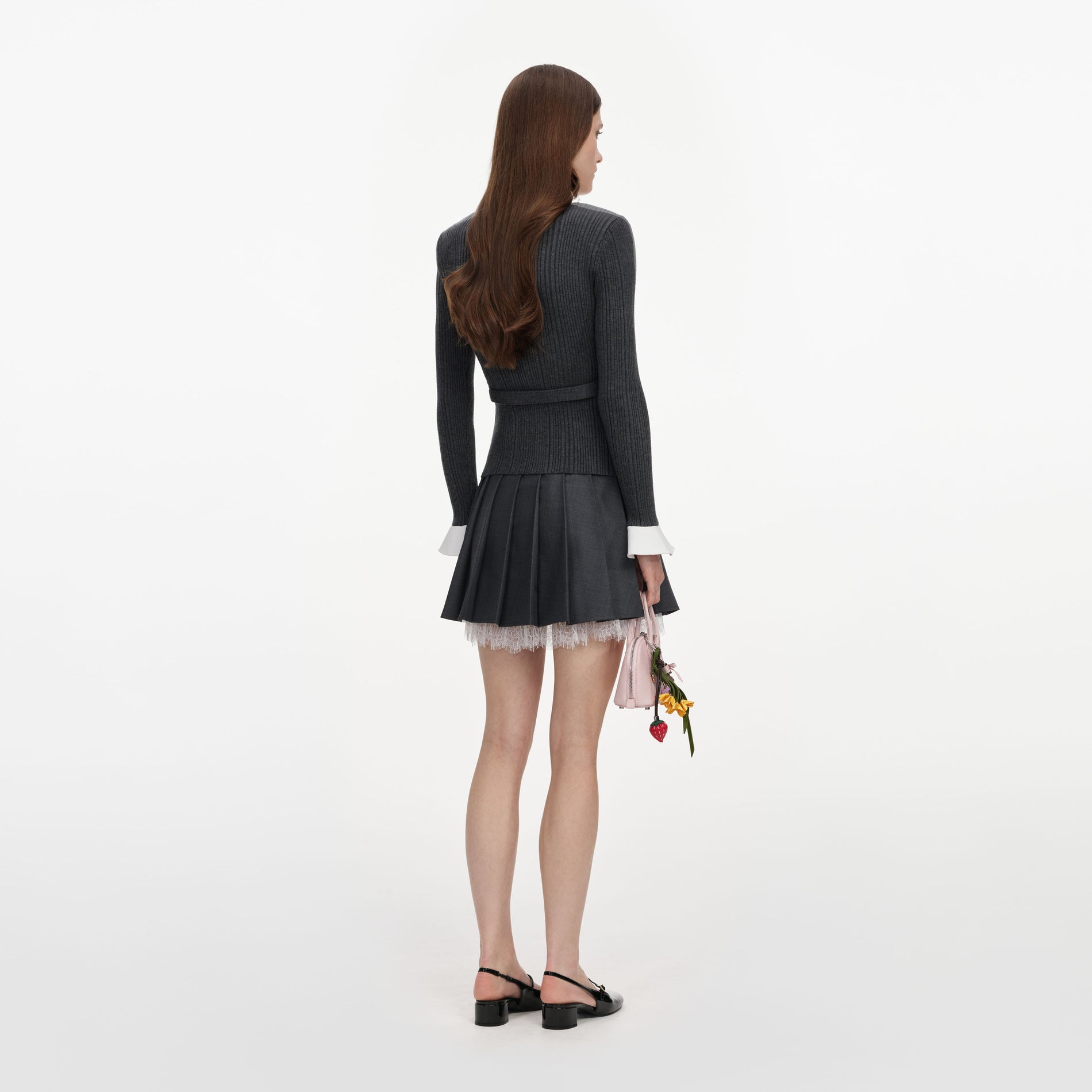 Back view of a woman wearing the Grey Ribbed Knit Cardigan