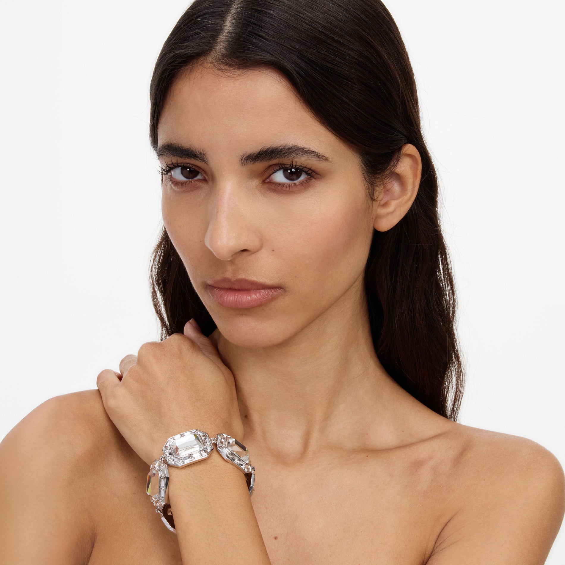 A close up of a woman wearing the Silver Crystal Bracelet