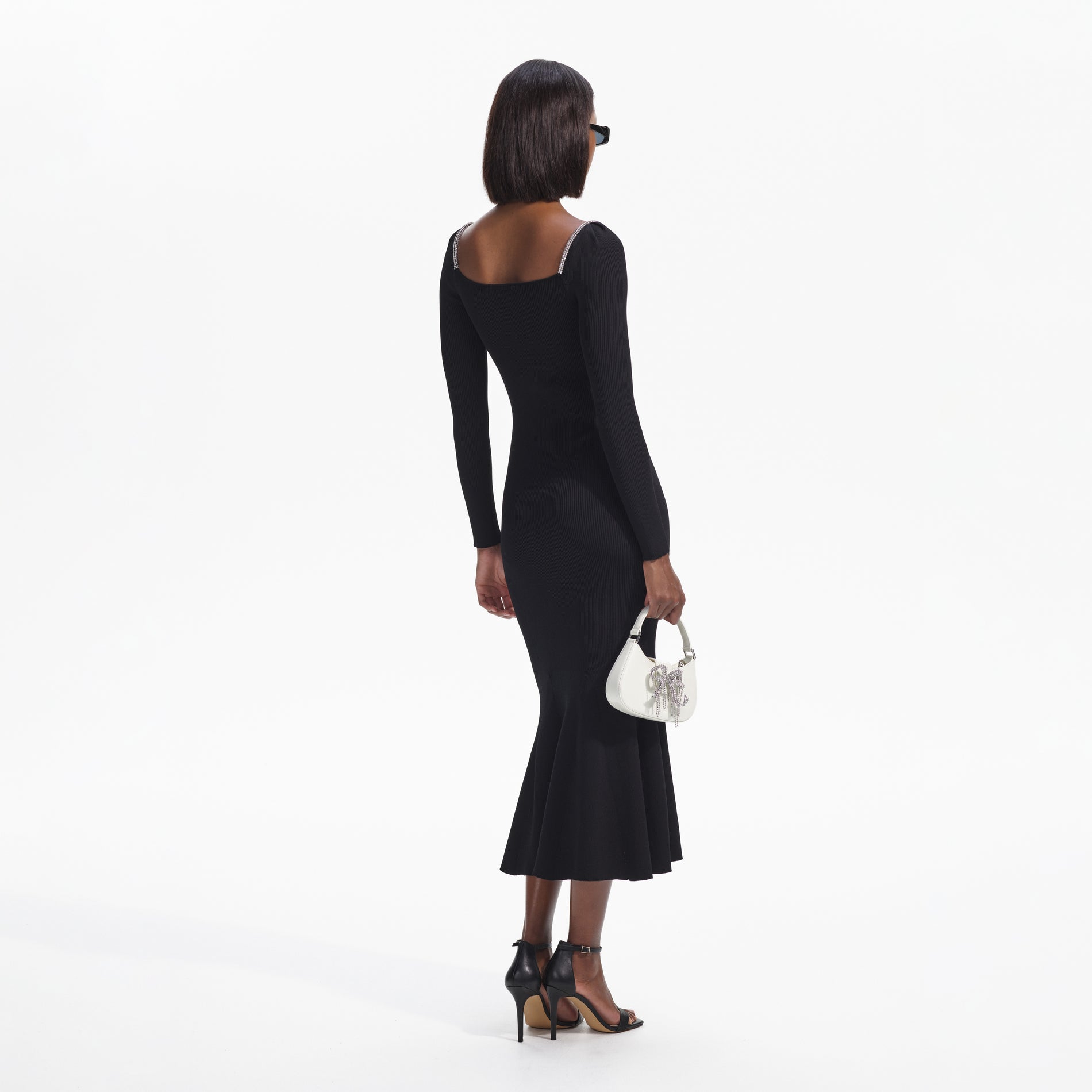 Back view of a woman wearing the Black Knit Diamante Trim Midi Dress