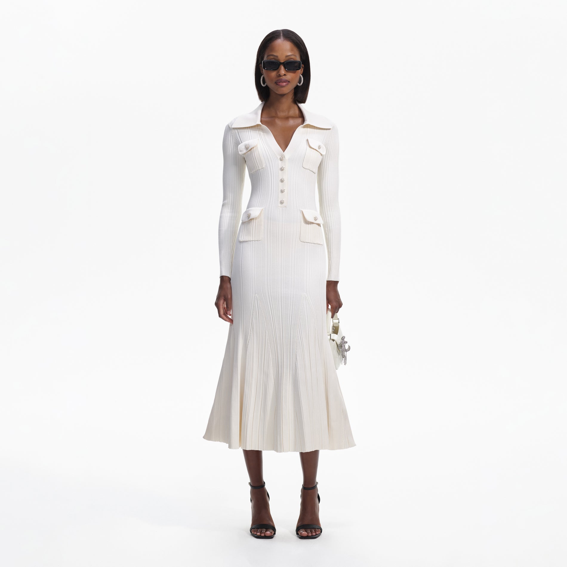 Front view of a woman wearing the Cream Knit Midi Dress