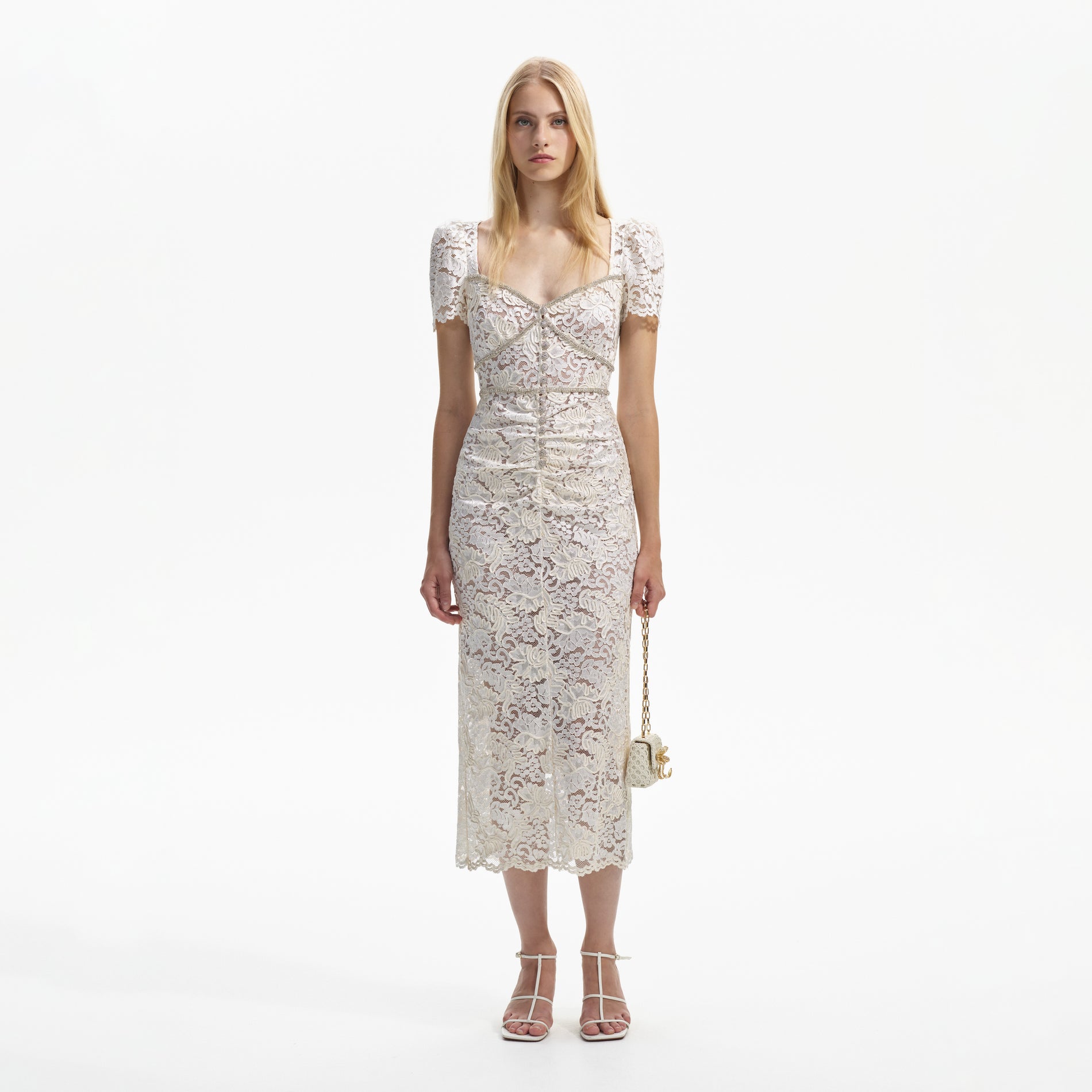 Front view of a woman wearing the Cream Cord Lace Midi Dress