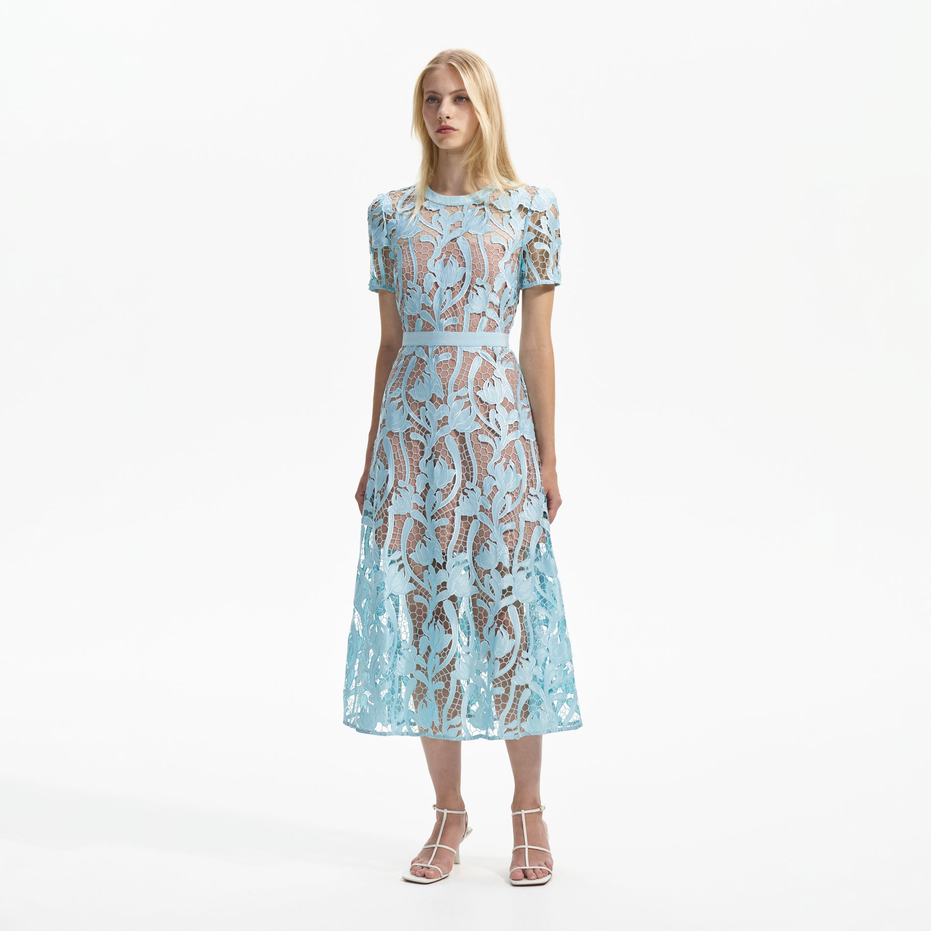 Side view of a woman wearing the Light Blue Lace Midi Dress