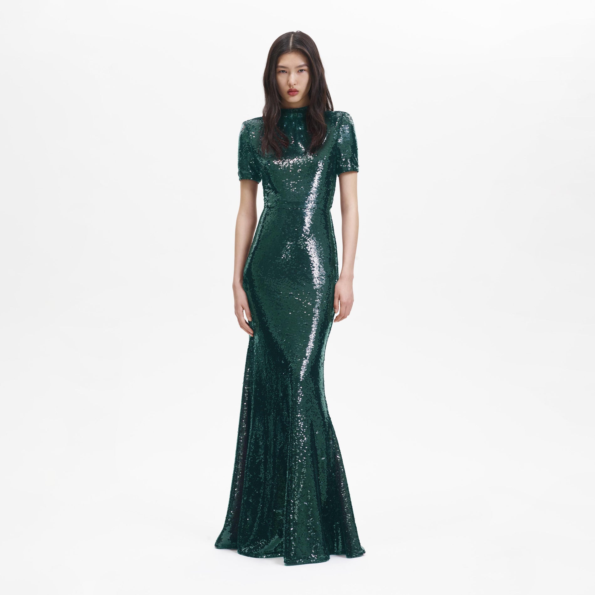 Front view of a woman wearing the Teal Sequin Maxi Dress