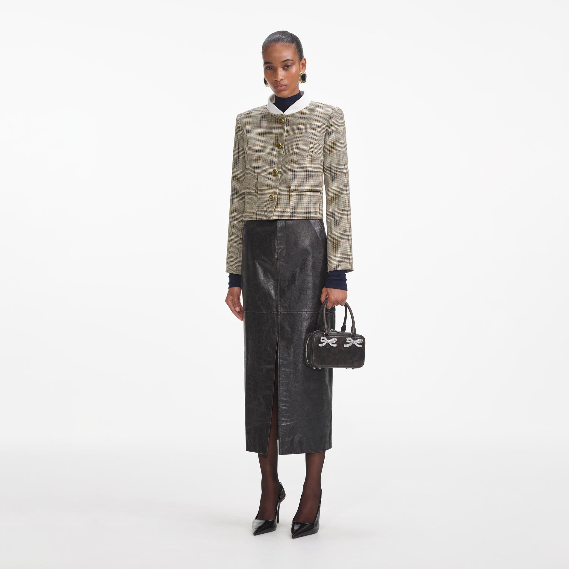 Side view of a woman wearing the Check Wool Jacket