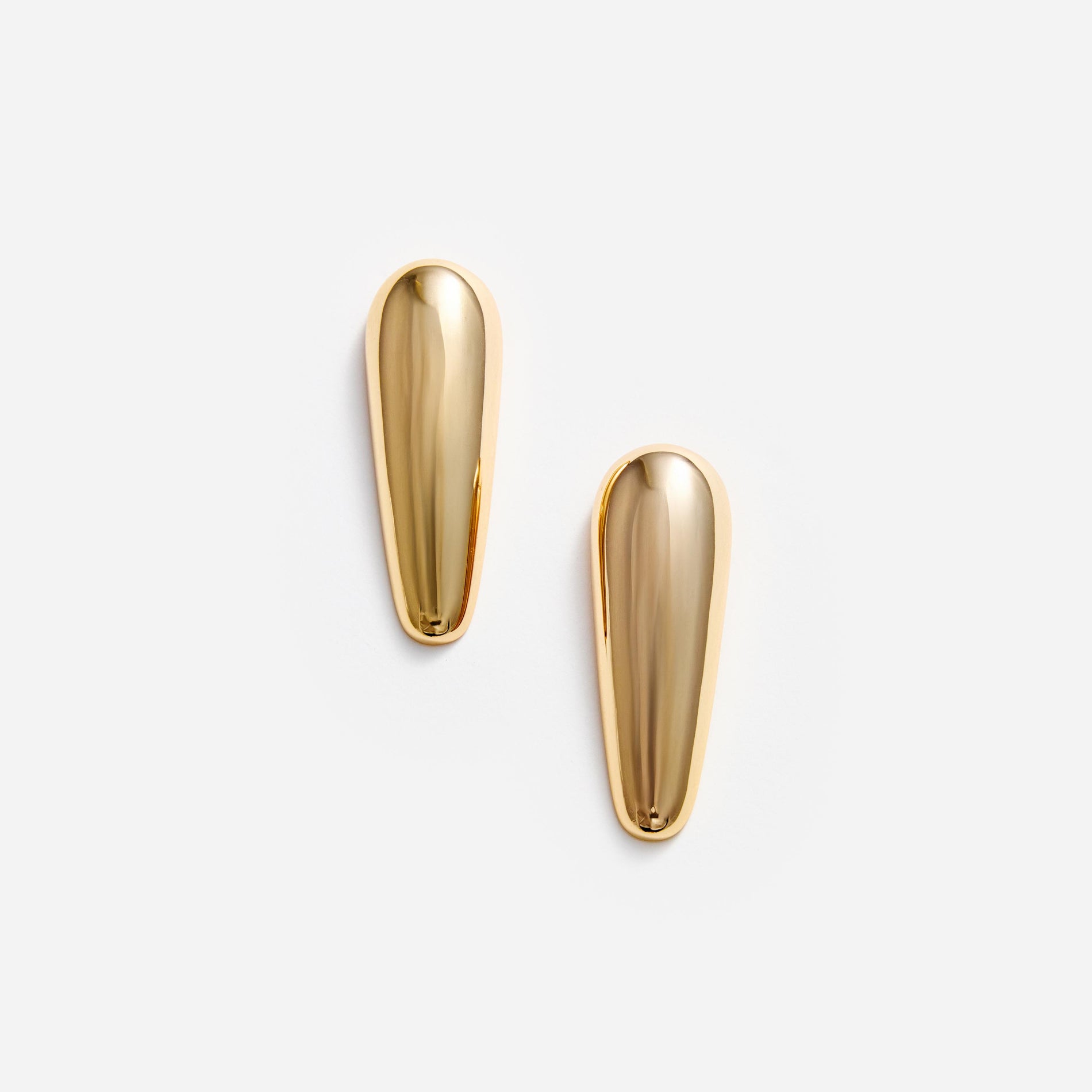 Front view of a woman wearing the Gold Bar Earrings