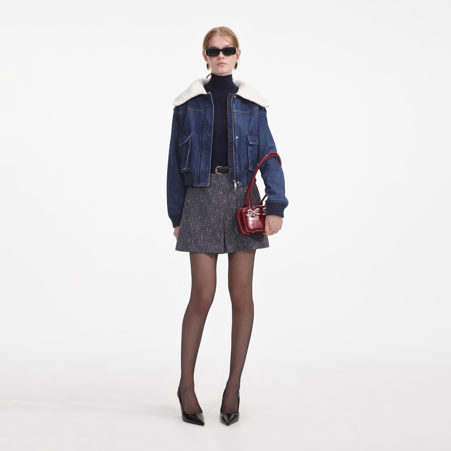 Front view of a woman wearing the Denim Knit Collar Jacket