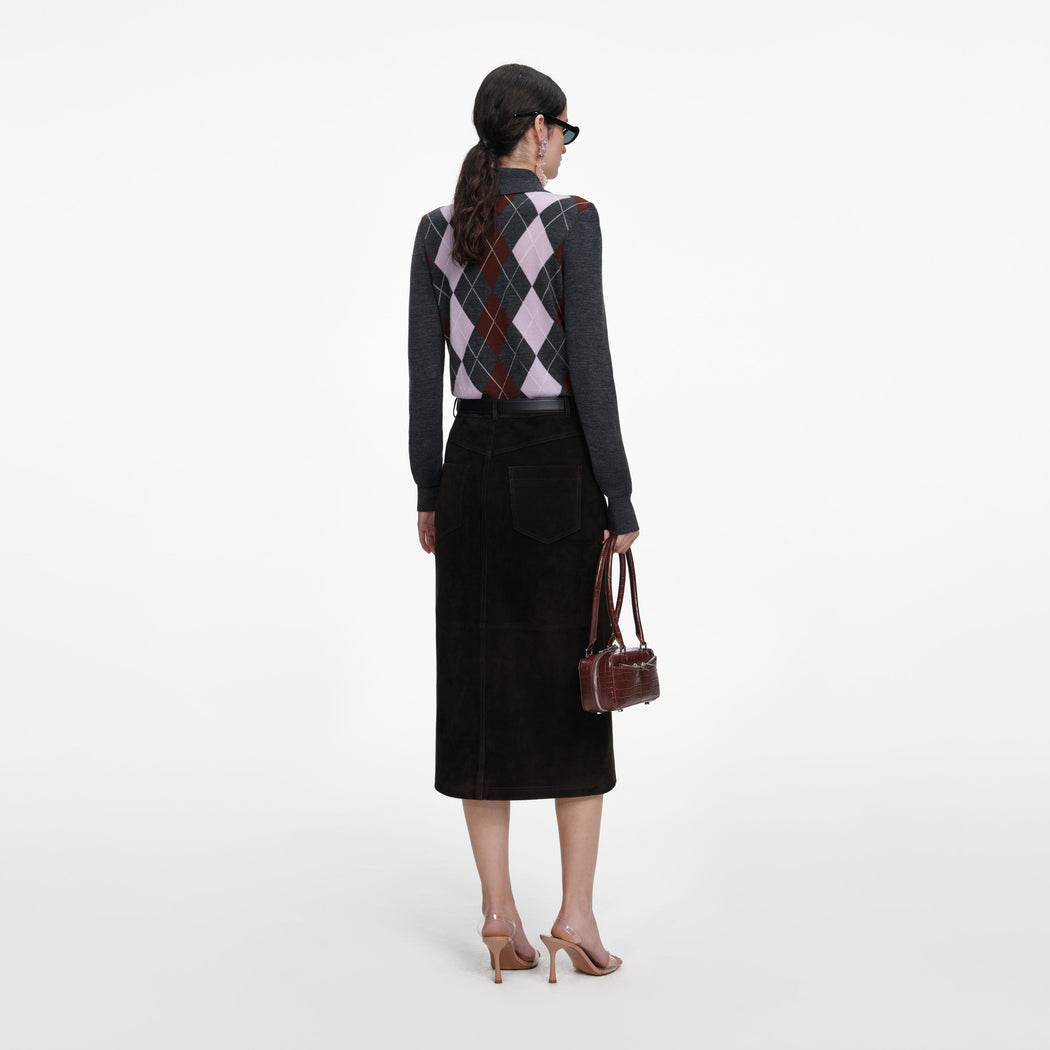 Back view of a woman wearing the Brown Suede Midi Skirt