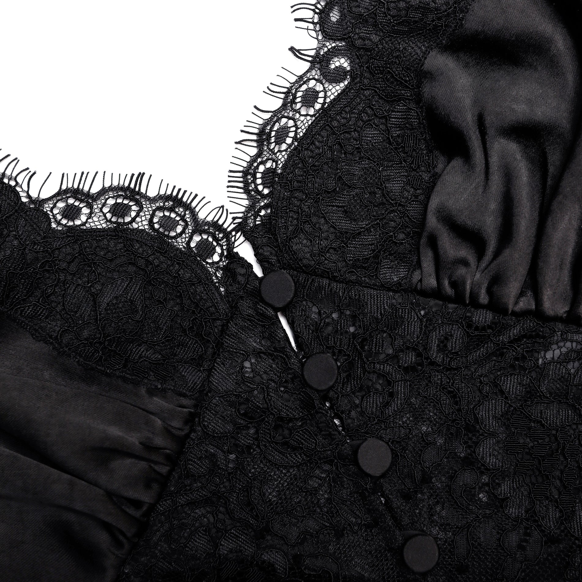 A close up of the fabric for the Black Satin Lace Top