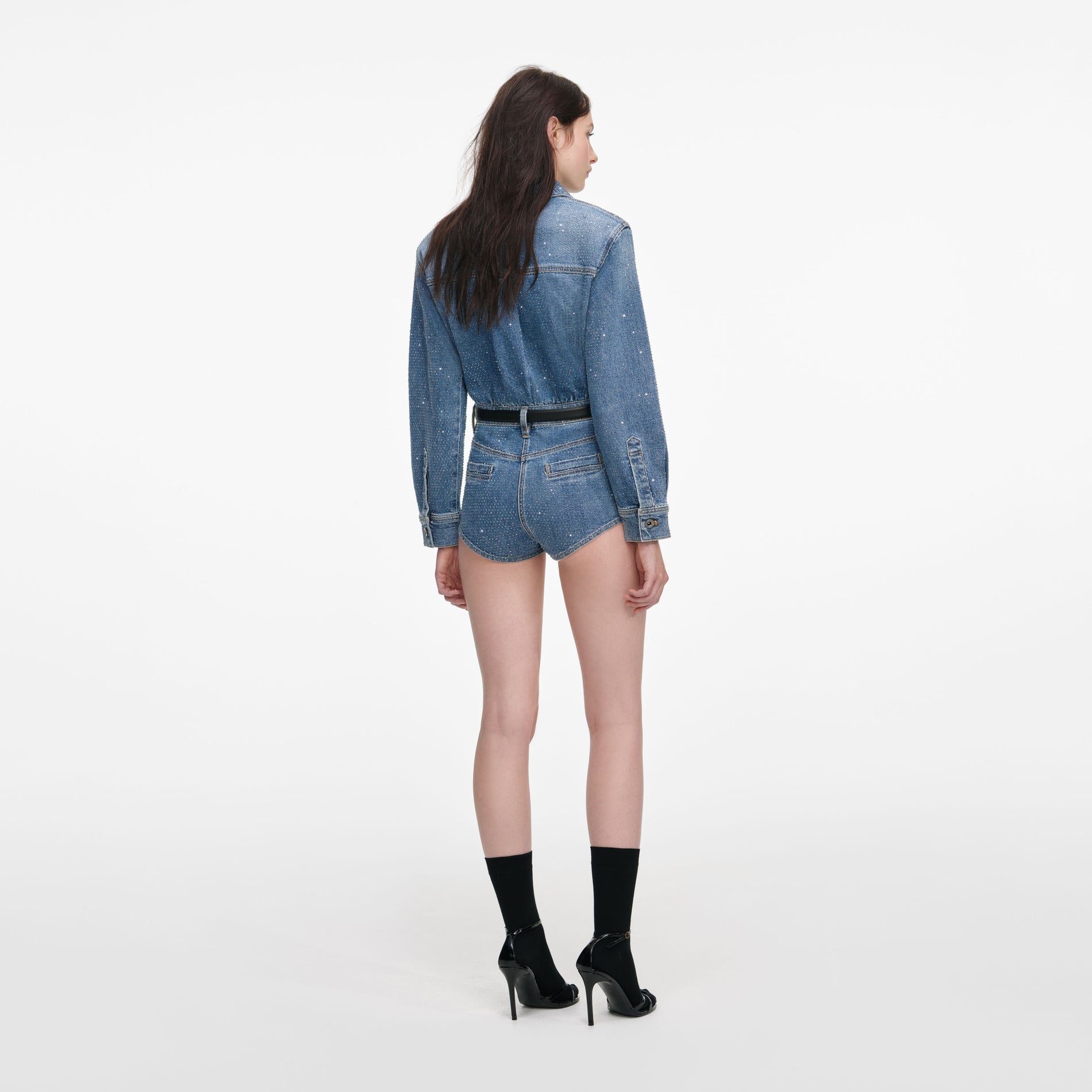 Back view of a woman wearing the Rhinestone Denim Playsuit