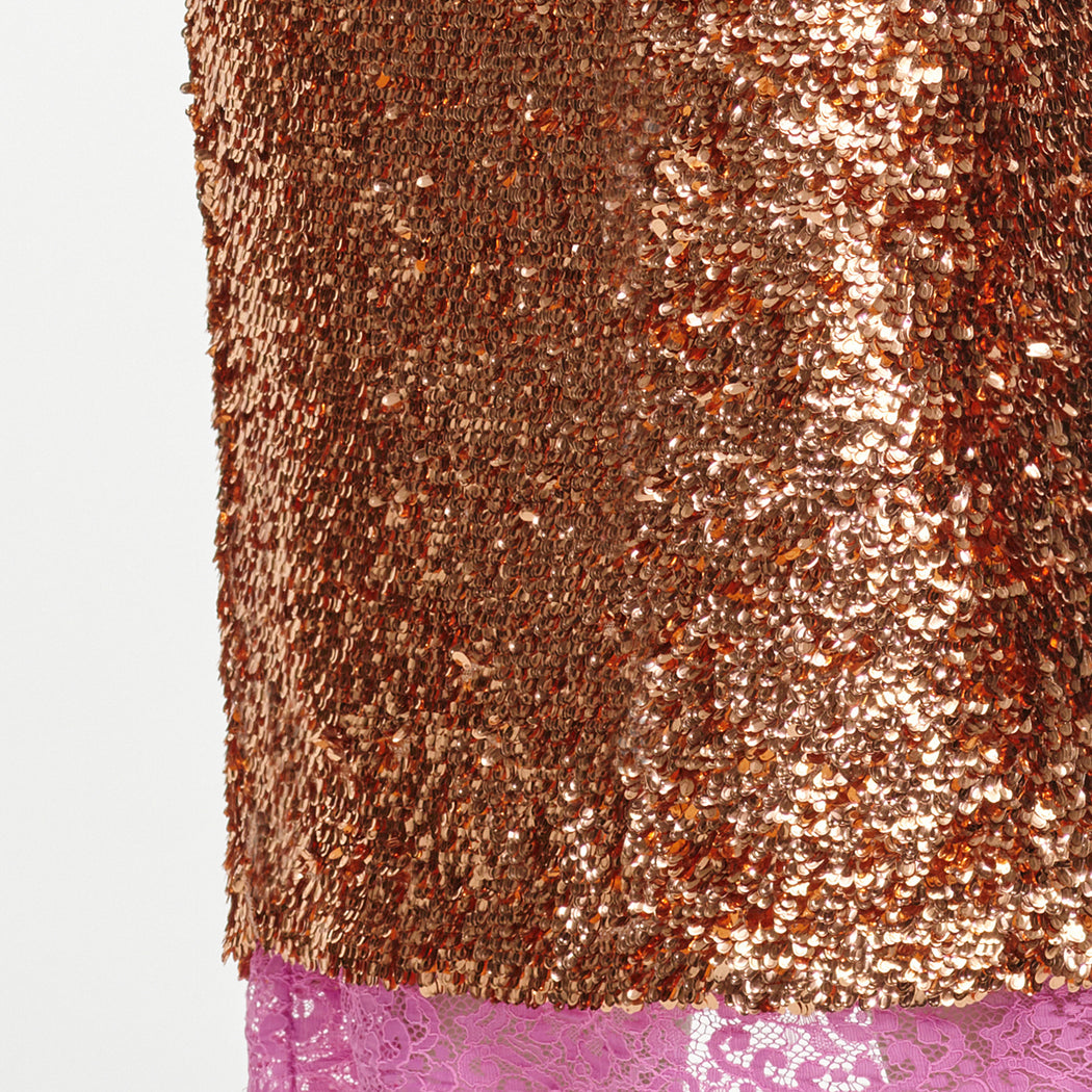 A close up of the fabric for the Gold Sequin Midi Skirt