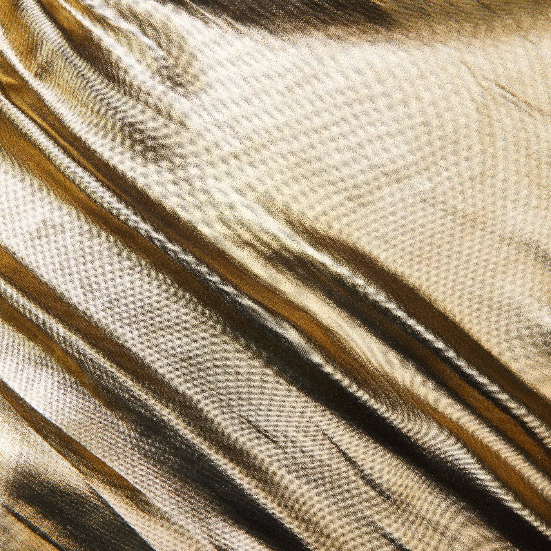 A close up of the fabric for the Gold Metallic Maxi Skirt