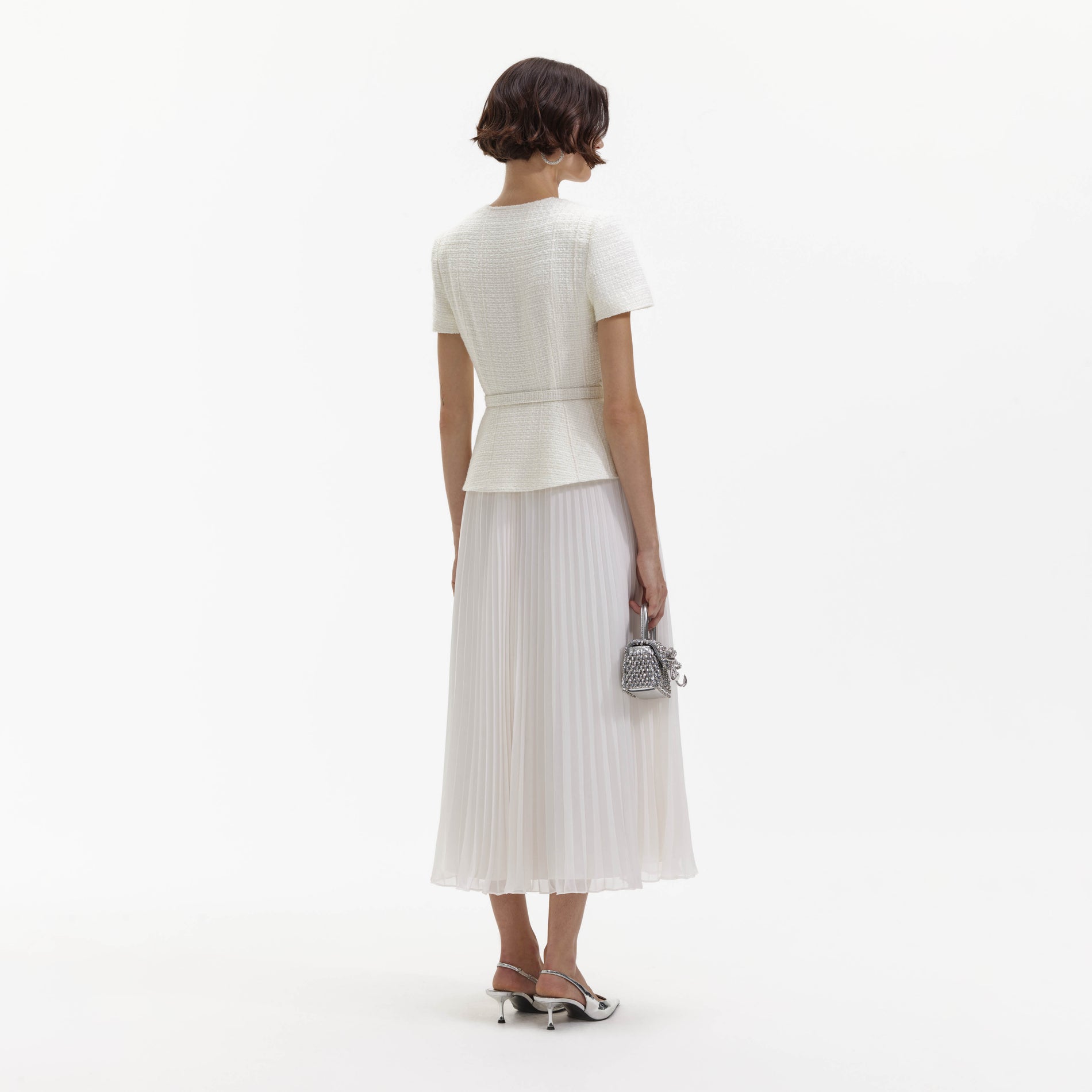 Back view of a woman wearing the Cream Boucle Chiffon Midi Dress