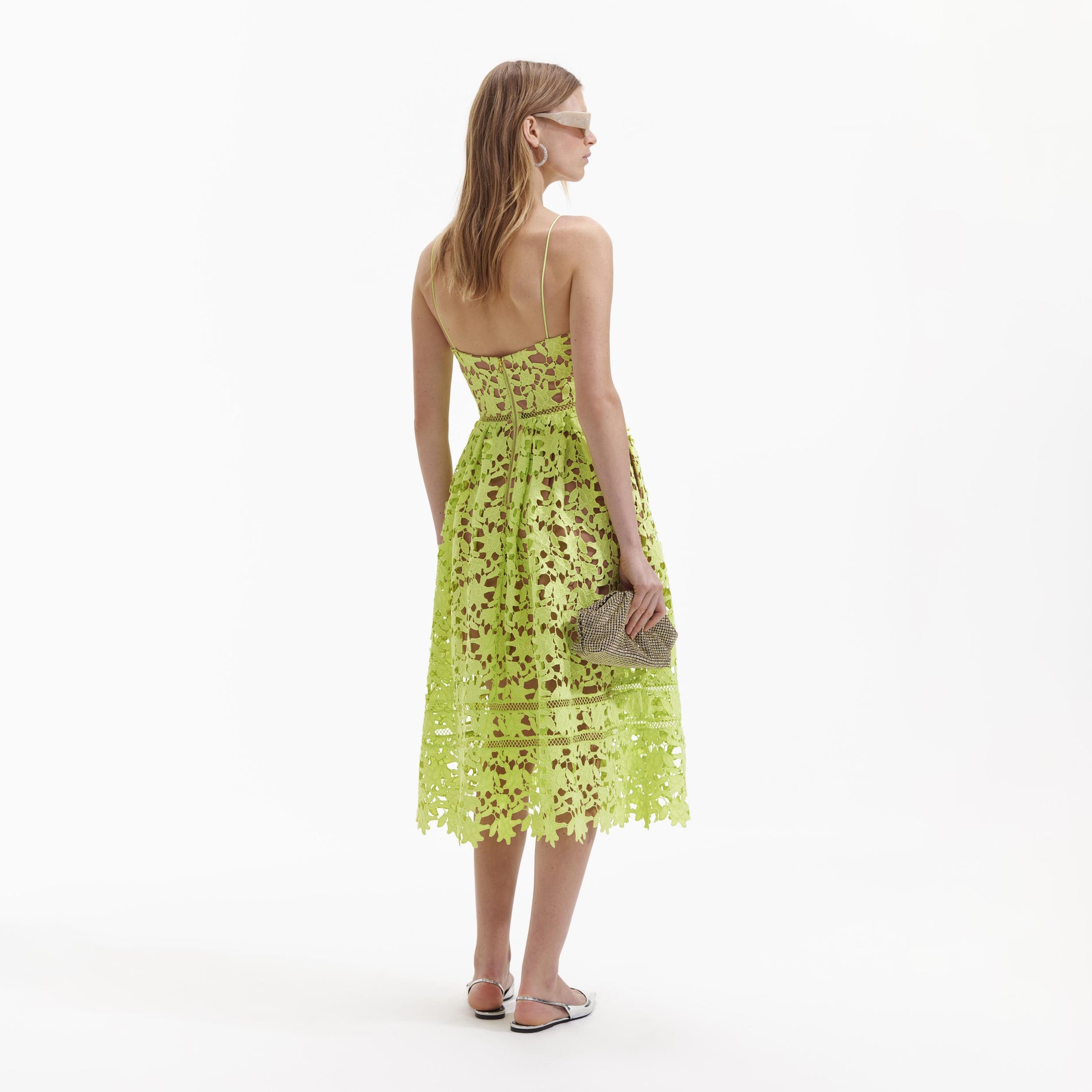 Back view of a woman wearing the Lime Azaelea Lace Midi Dress