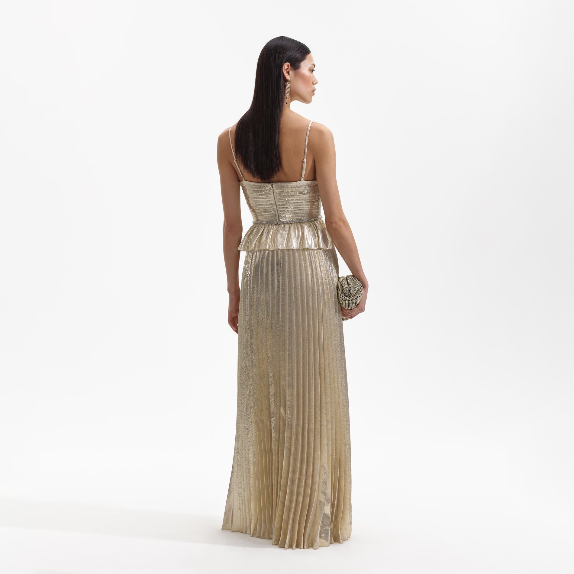 Back view of a woman wearing the Gold Metallic Maxi Dress