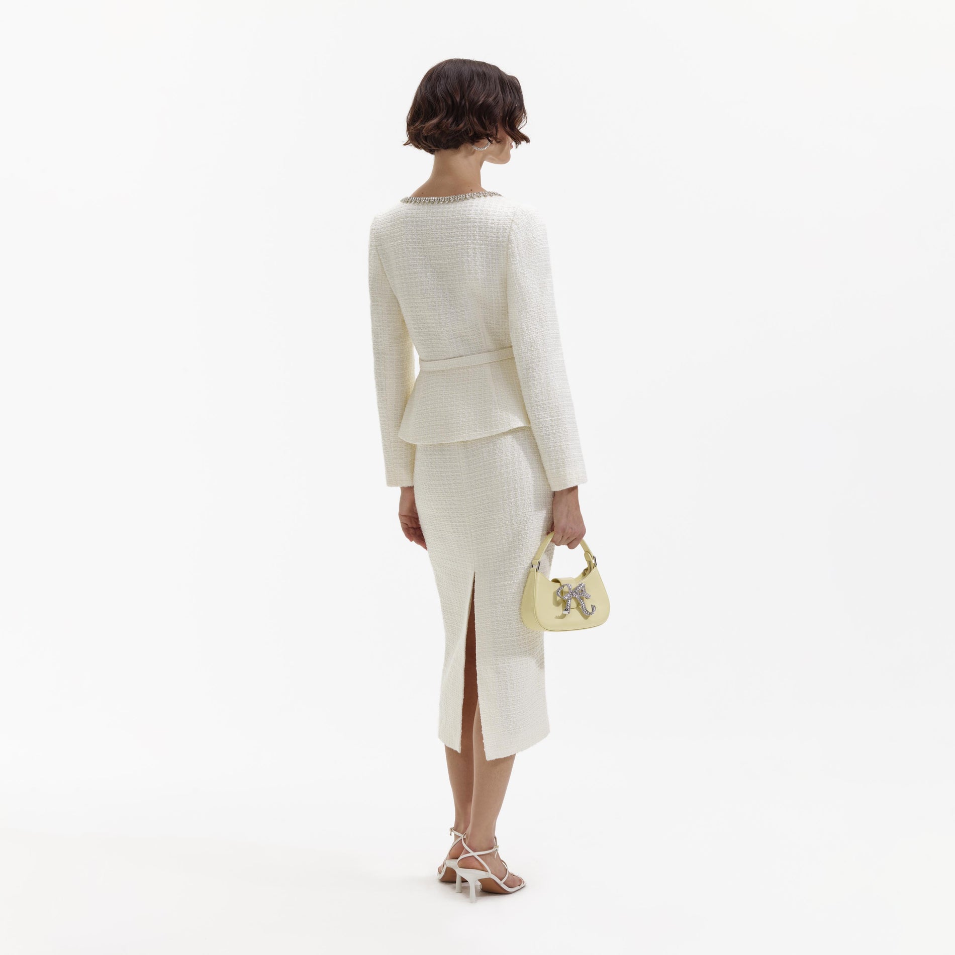 Back view of a woman wearing the Cream Boucle Diamante Trim Midi Dress