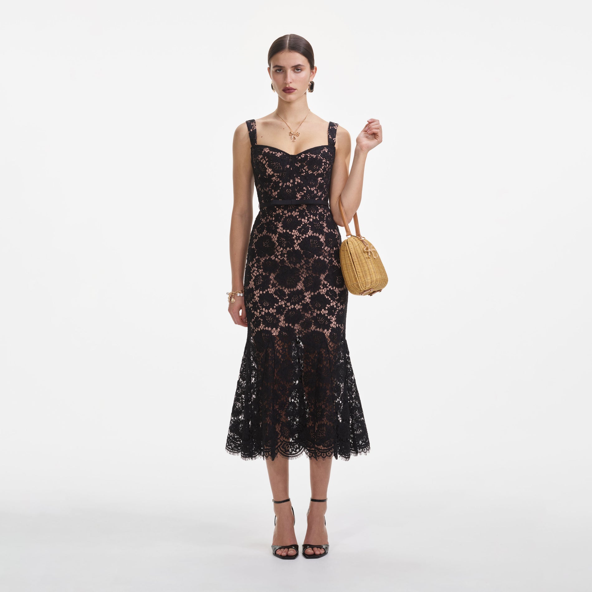 Front view of a woman wearing the Black Fine Lace Midi Dress