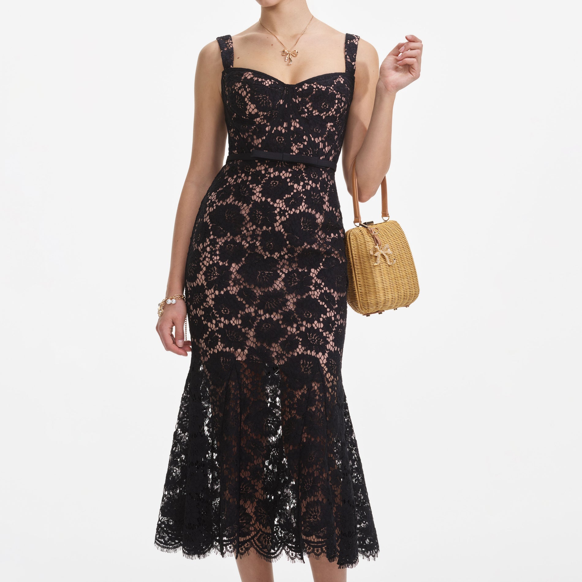 A close up of a woman wearing the Black Fine Lace Midi Dress