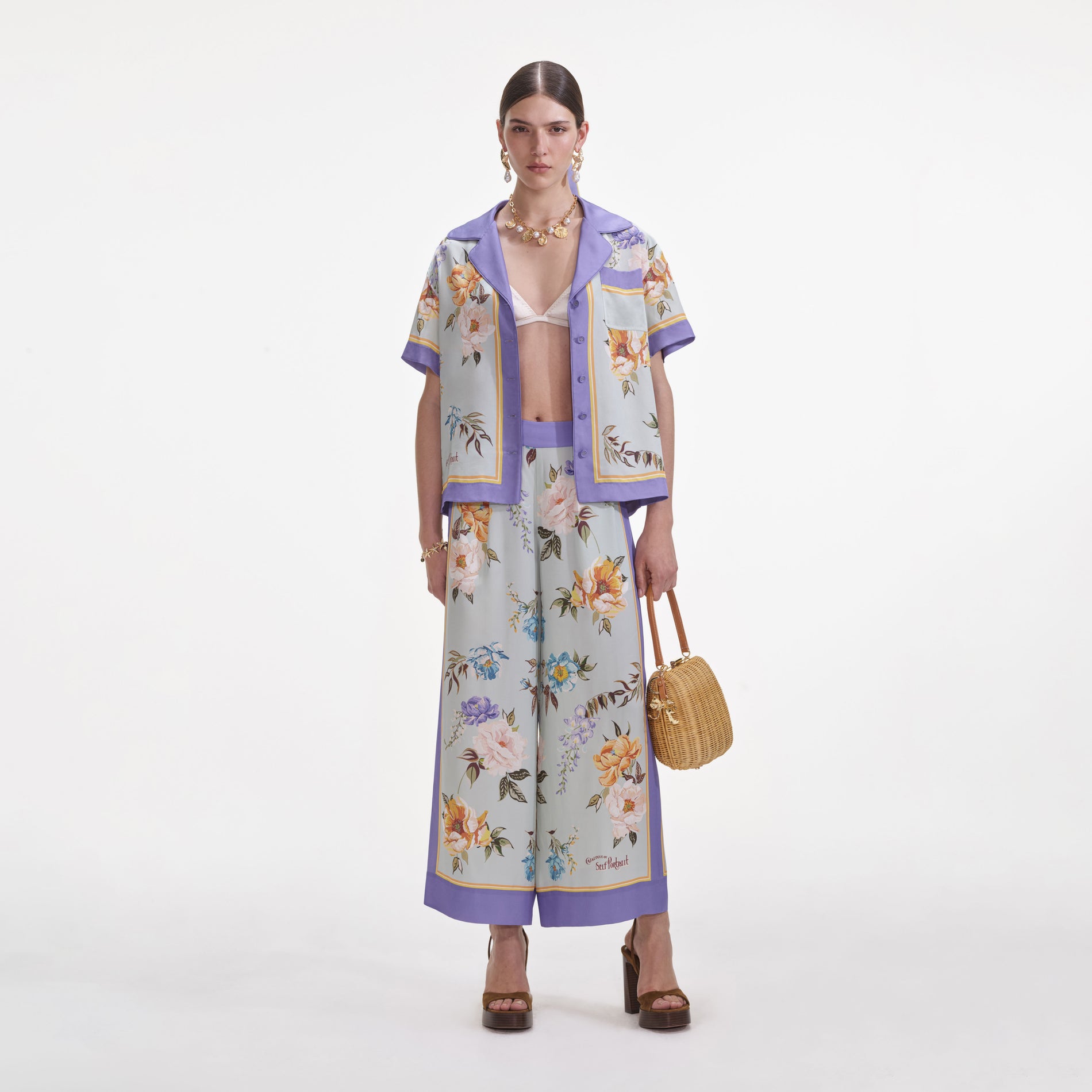 Front view of a woman wearing the Blue Floral Viscose Shirt