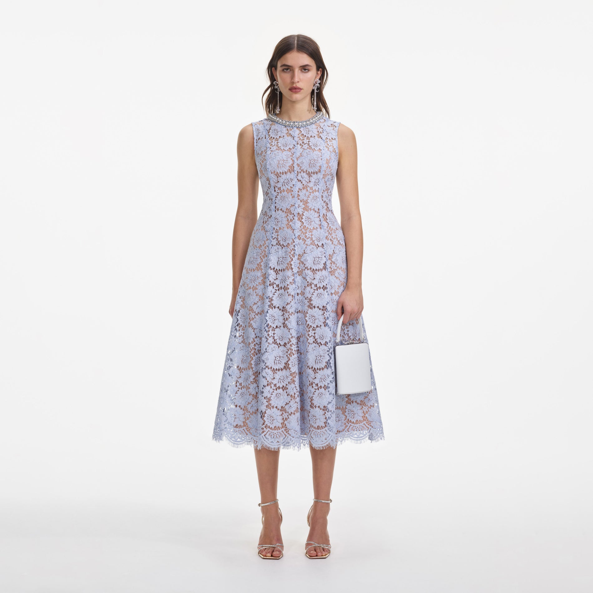 Front view of a woman wearing the Blue Fine Lace Pearl Midi Dress