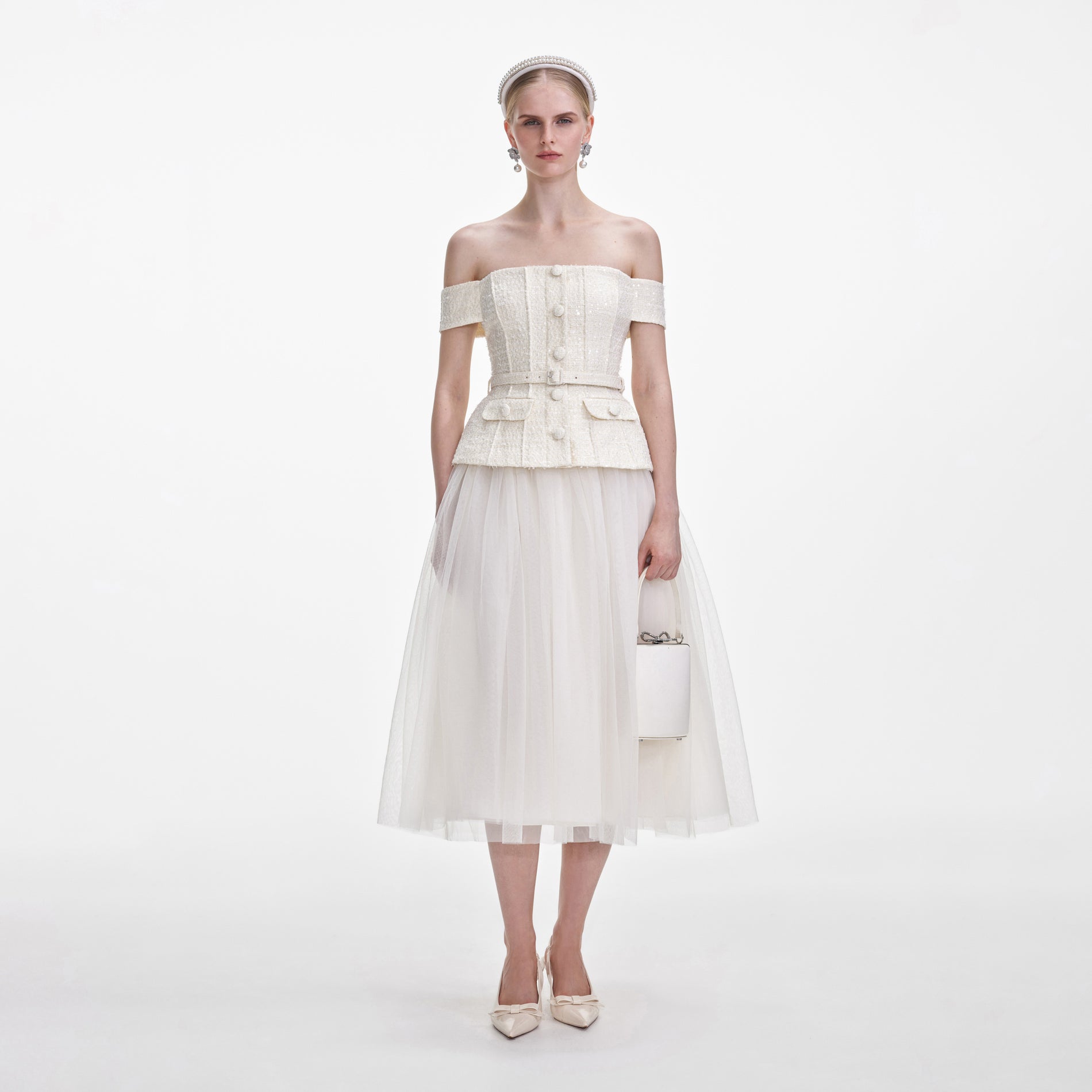 Front view of a woman wearing the Cream Boucle Tulle Midi Dress