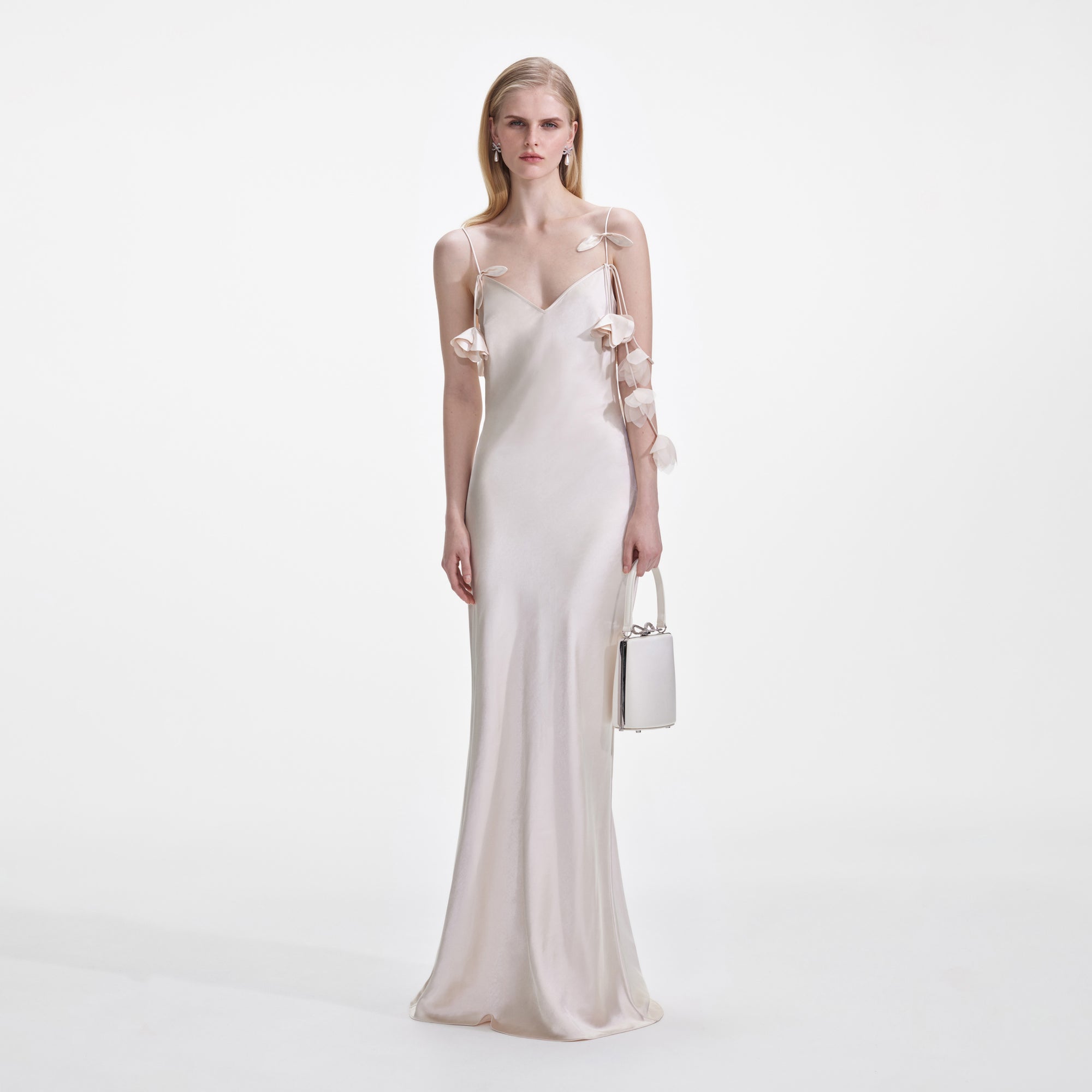 Front view of a woman wearing the Champagne Flower Satin Maxi Dress