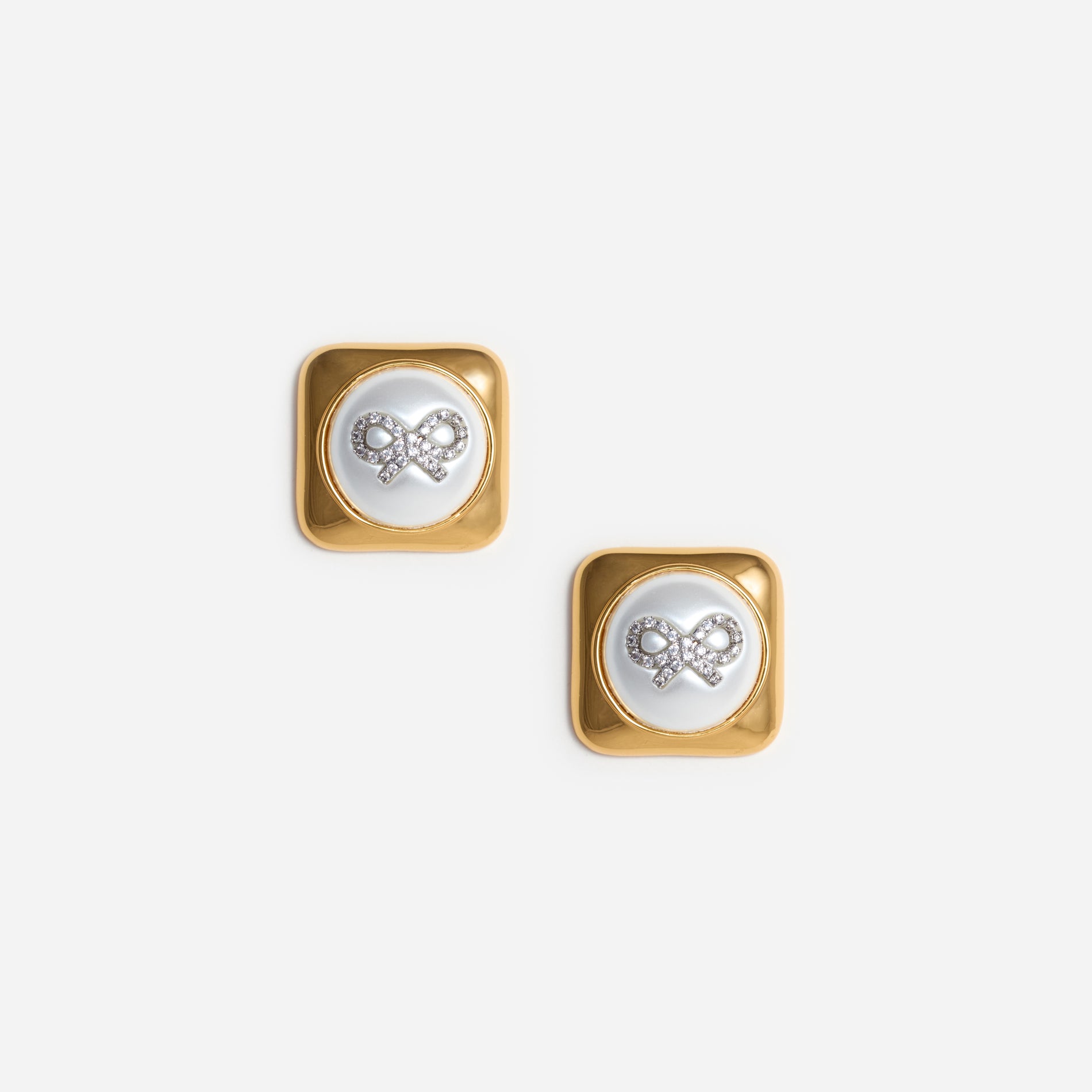A photo of the Bow Pearl Gold Square Earrings