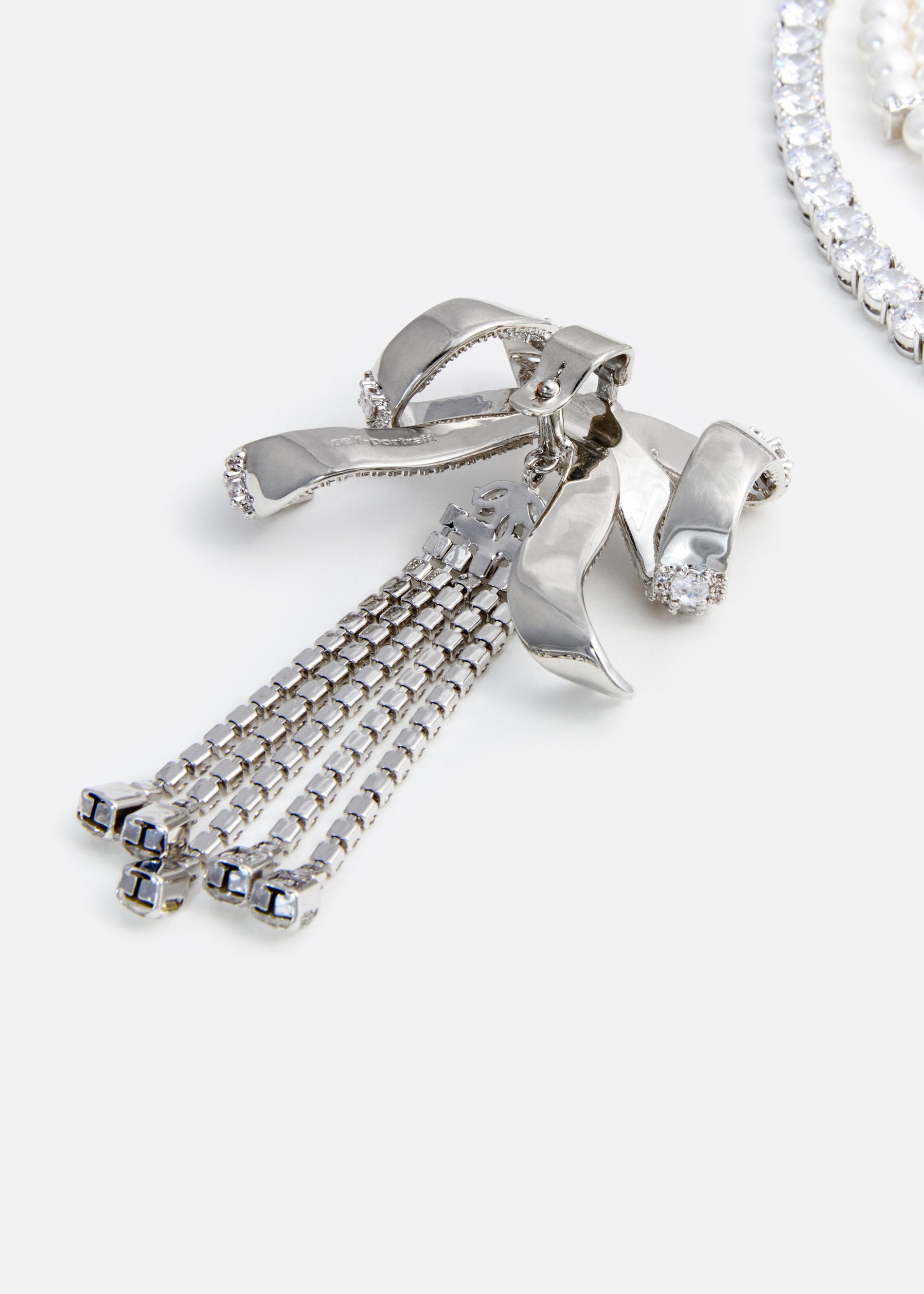 A photo of the Crystal Bow Droplet Pearl Necklace