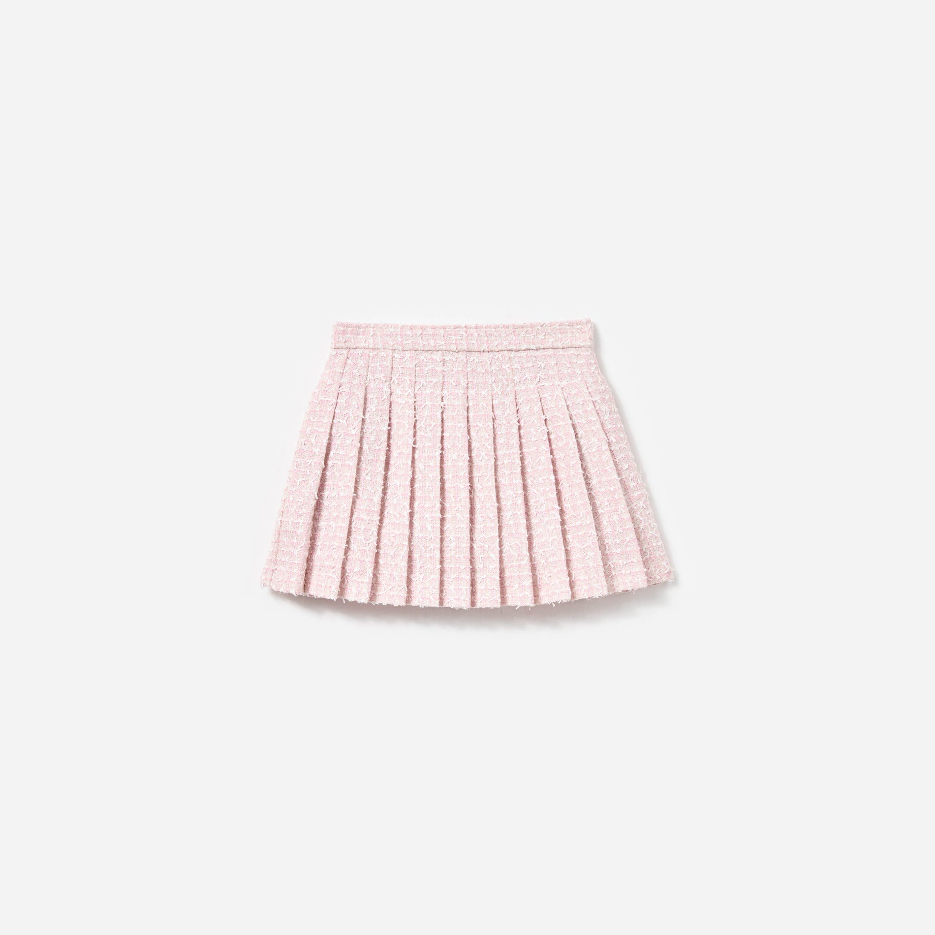 Front view of a woman wearing the Pink Bow Boucle Skirt